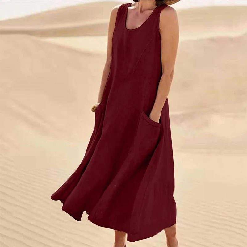 Women's beige relaxed summer dress with pockets, breathable fabric, versatile breezy beachwear silhouette