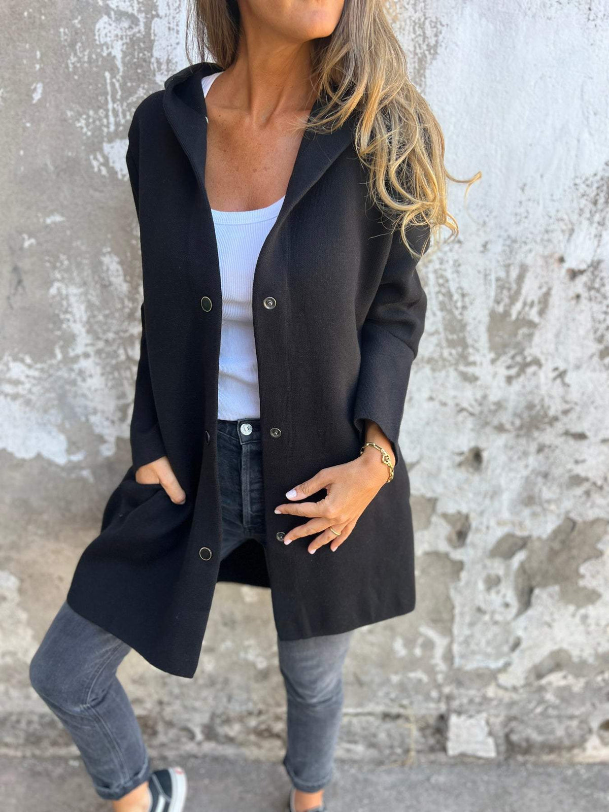 Women's cozy hooded cardigan in soft cotton blend with relaxed fit and button closure