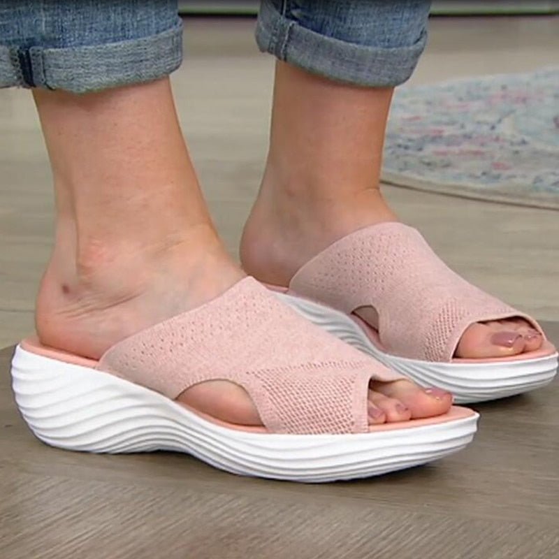 Women's slip-on sandals with breathable knit upper, ergonomic footbed, and soft shock-absorbing sole