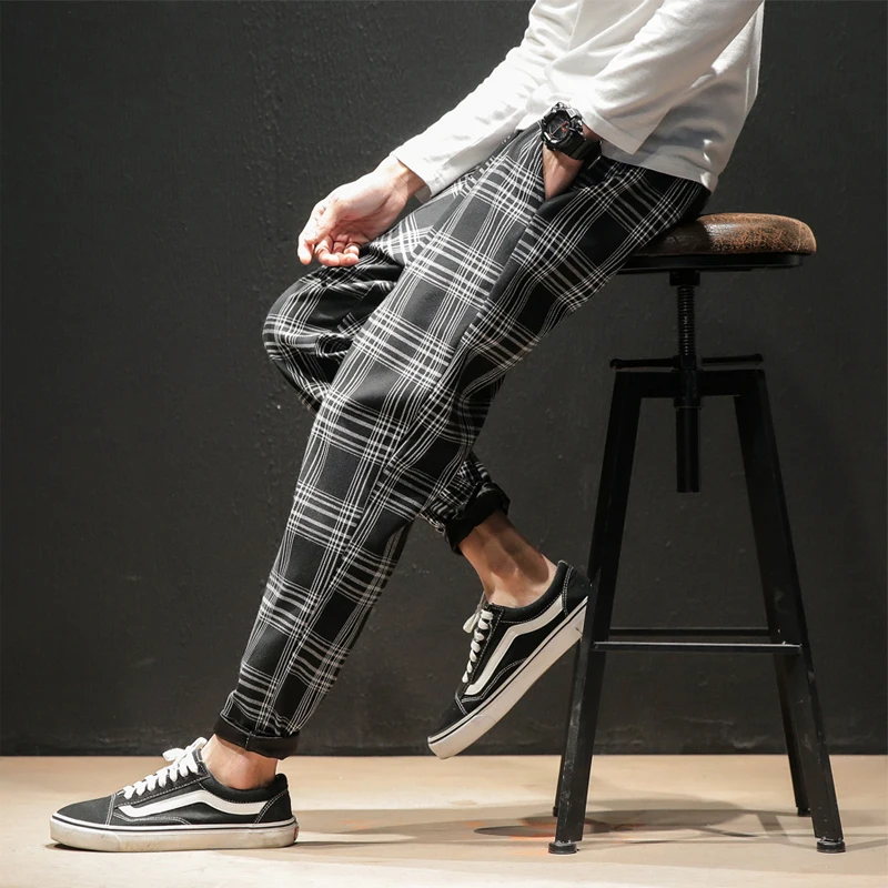 Men's plaid relaxed tapered trousers with cuffed hem, smart casual stretch waist versatility