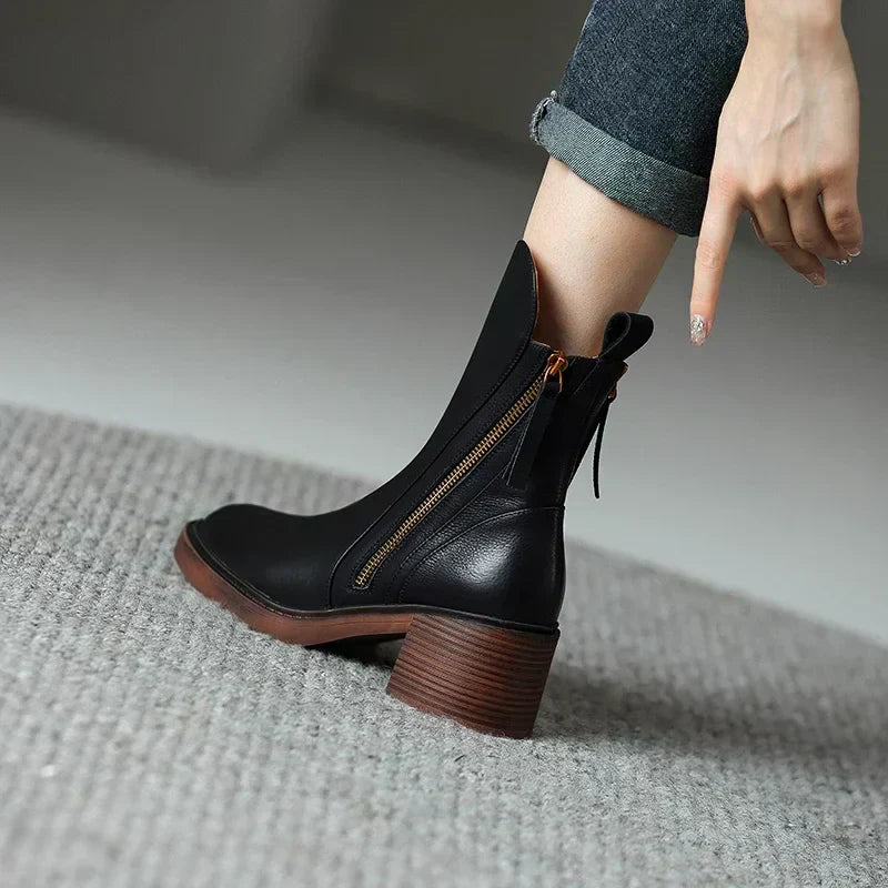 Isla women's sleek black ankle boots with clean lines and refined silhouette for all-day comfort