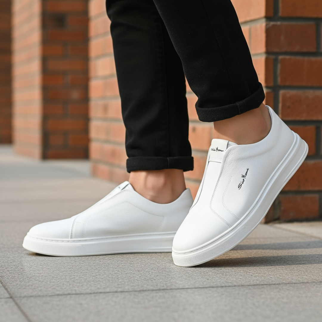 Black synthetic leather men's orthopedic slip-on sneaker with built-in plantar support and cushioned sole