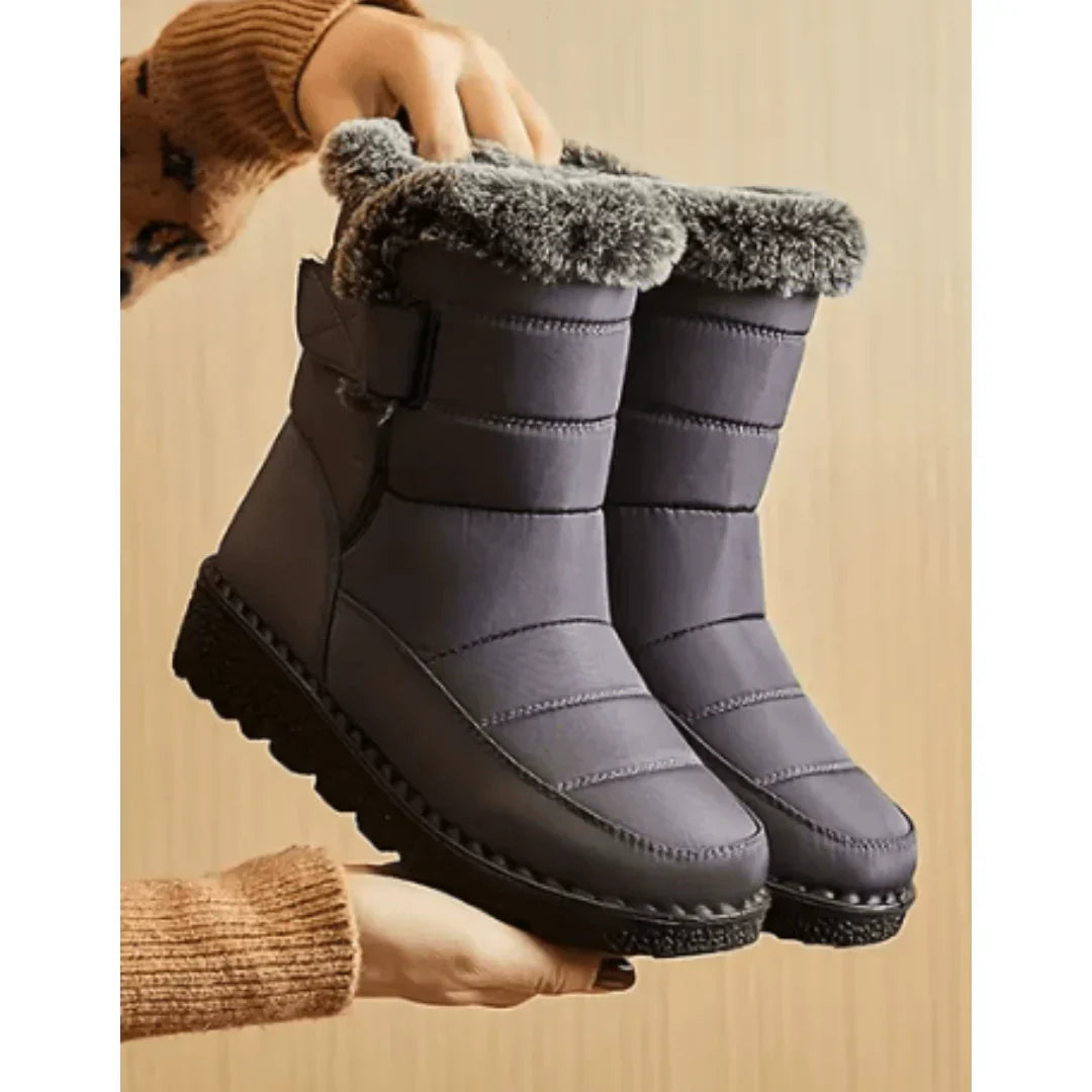 Women's waterproof winter boots with warm insulation, secure fit, and cold-weather protection for daily wear