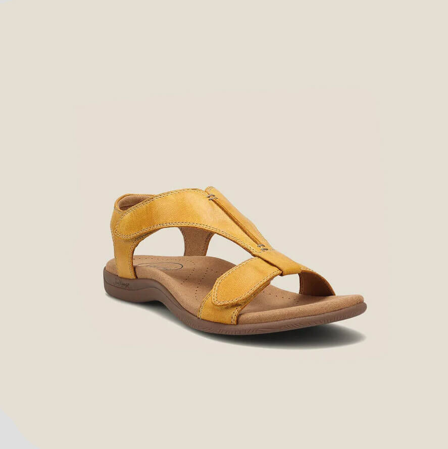 Beige adjustable strap sandals with contoured footbed and lightweight open-toe design for all-day comfort