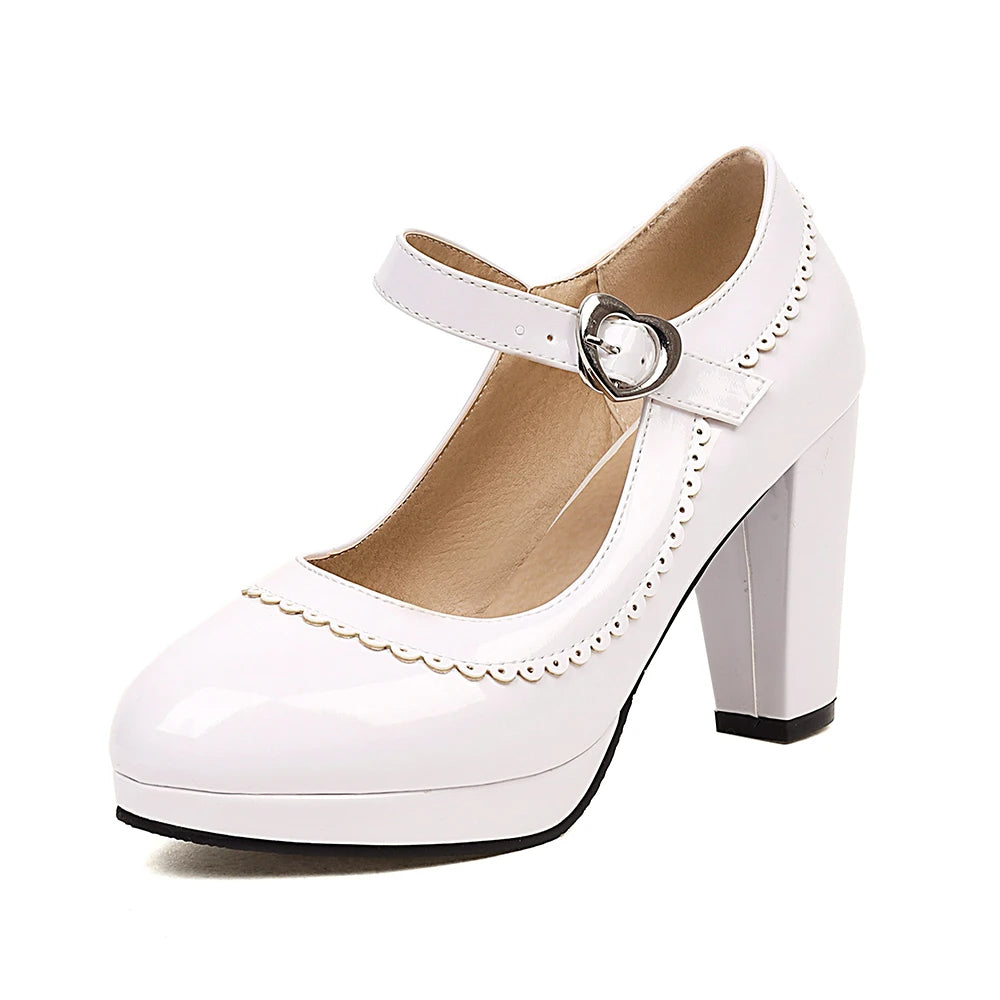 Black patent vegan leather Mary Jane heels with scalloped edges and heart buckle retro style