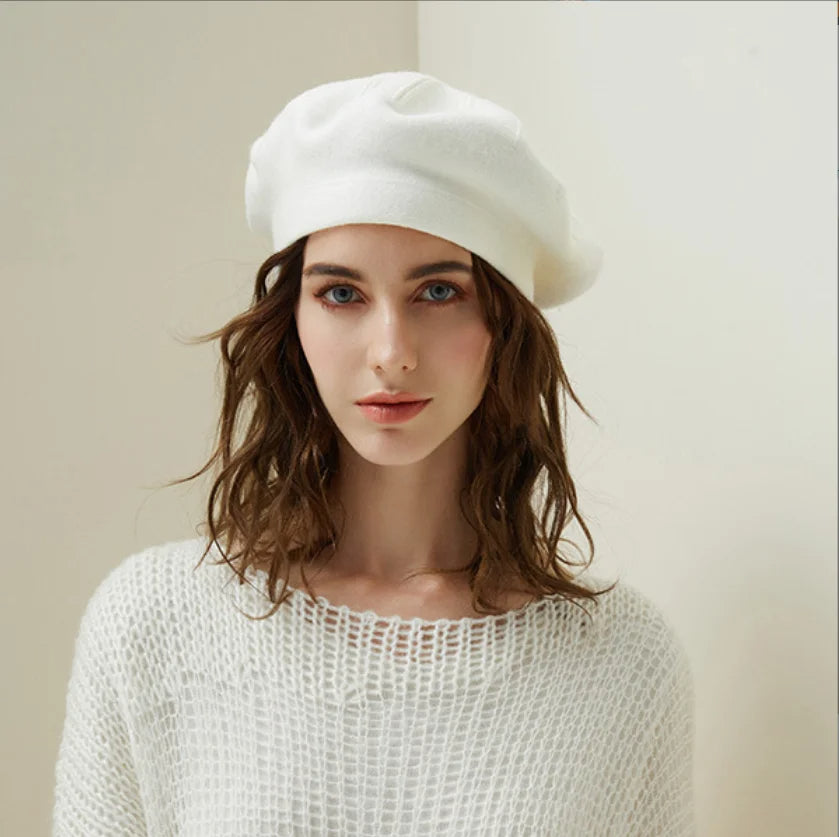 Women's slouchy rounded wool beret in soft neutral tone, relaxed silhouette with cozy casual everyday style