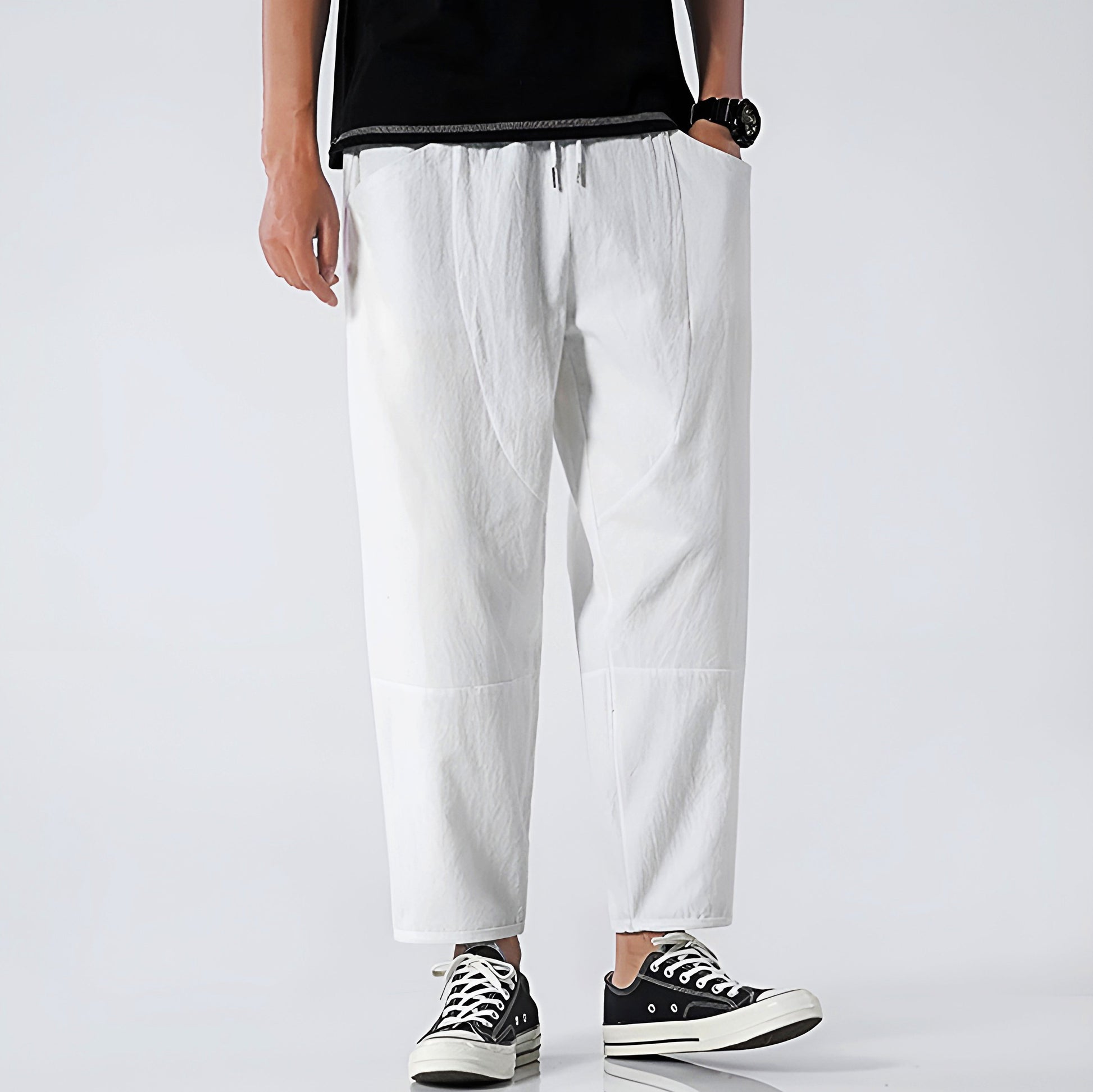 Beige cropped relaxed-fit linen blend pants with adjustable drawstring waist for urban everyday wear