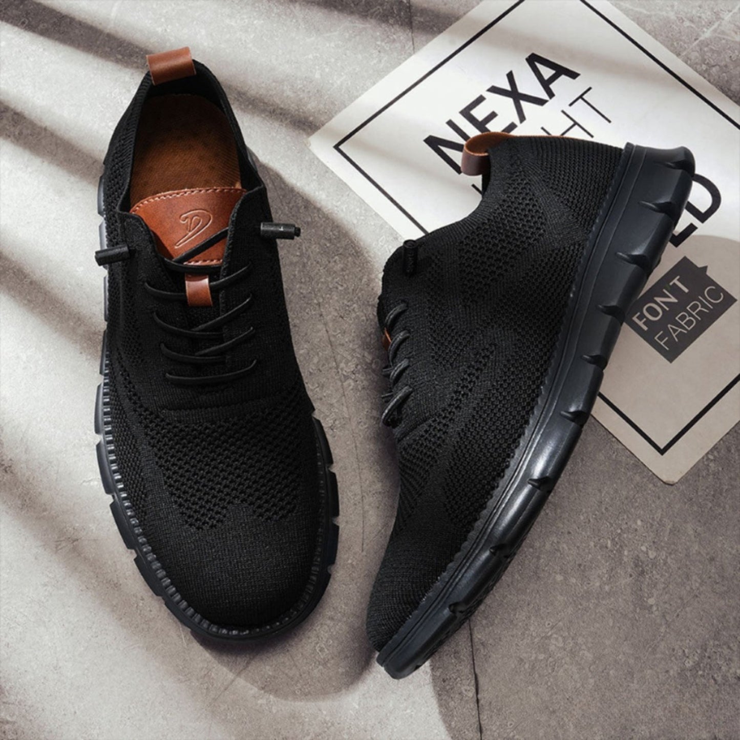 Lightweight knit men's sneakers with breathable mesh upper, cushioned midsole, casual lace-up style
