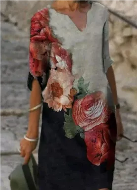 Women's floral midi dress, V-neck, artistic face print with delicate floral accents, sophisticated everyday style