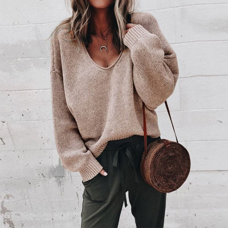 Modern women's professional gray sweater with classic silhouette and timeless elegant cut for polished style