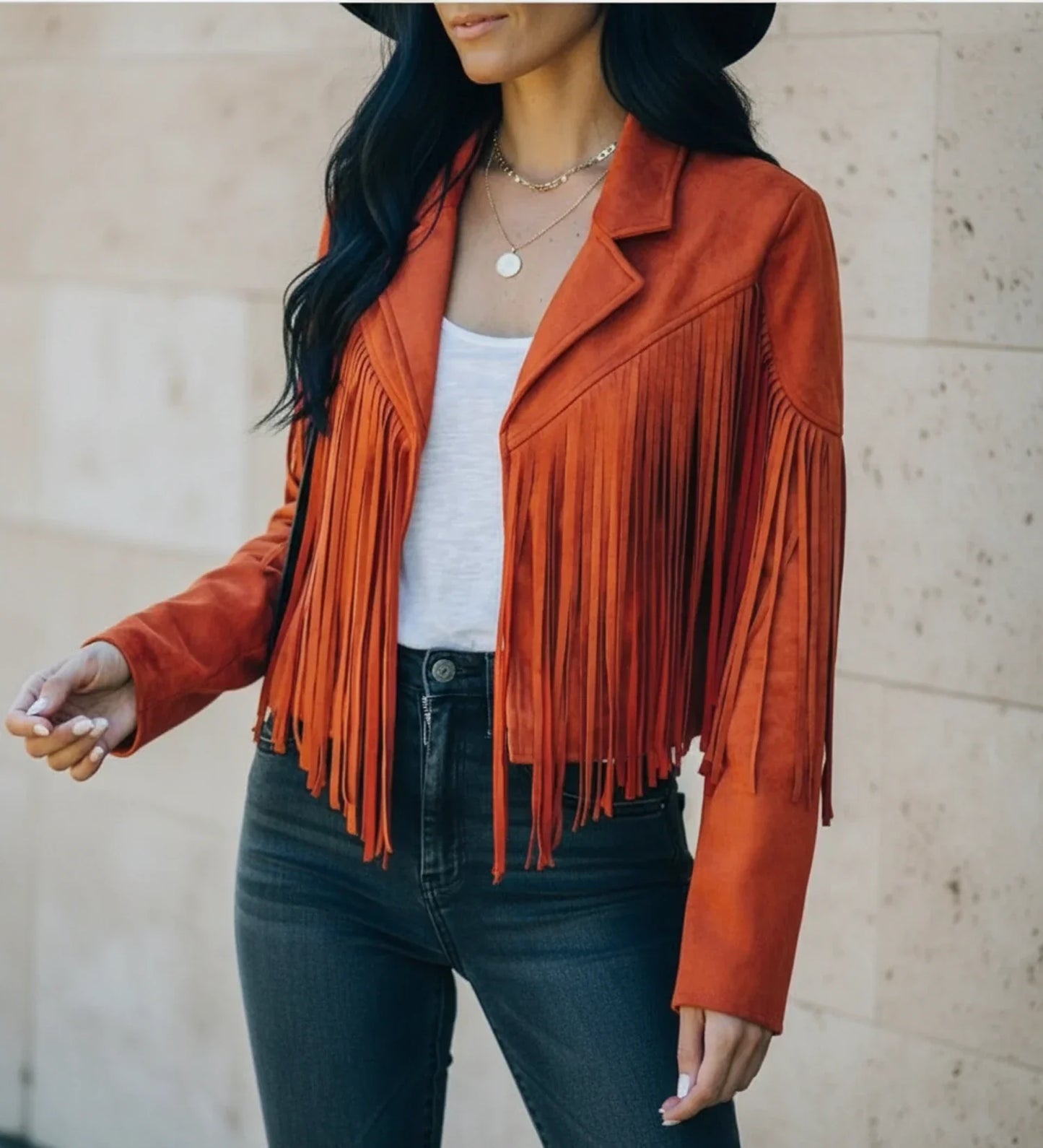 Women's cropped fringed moto jacket open front notch lapel bold Western style with flowing fringe detail