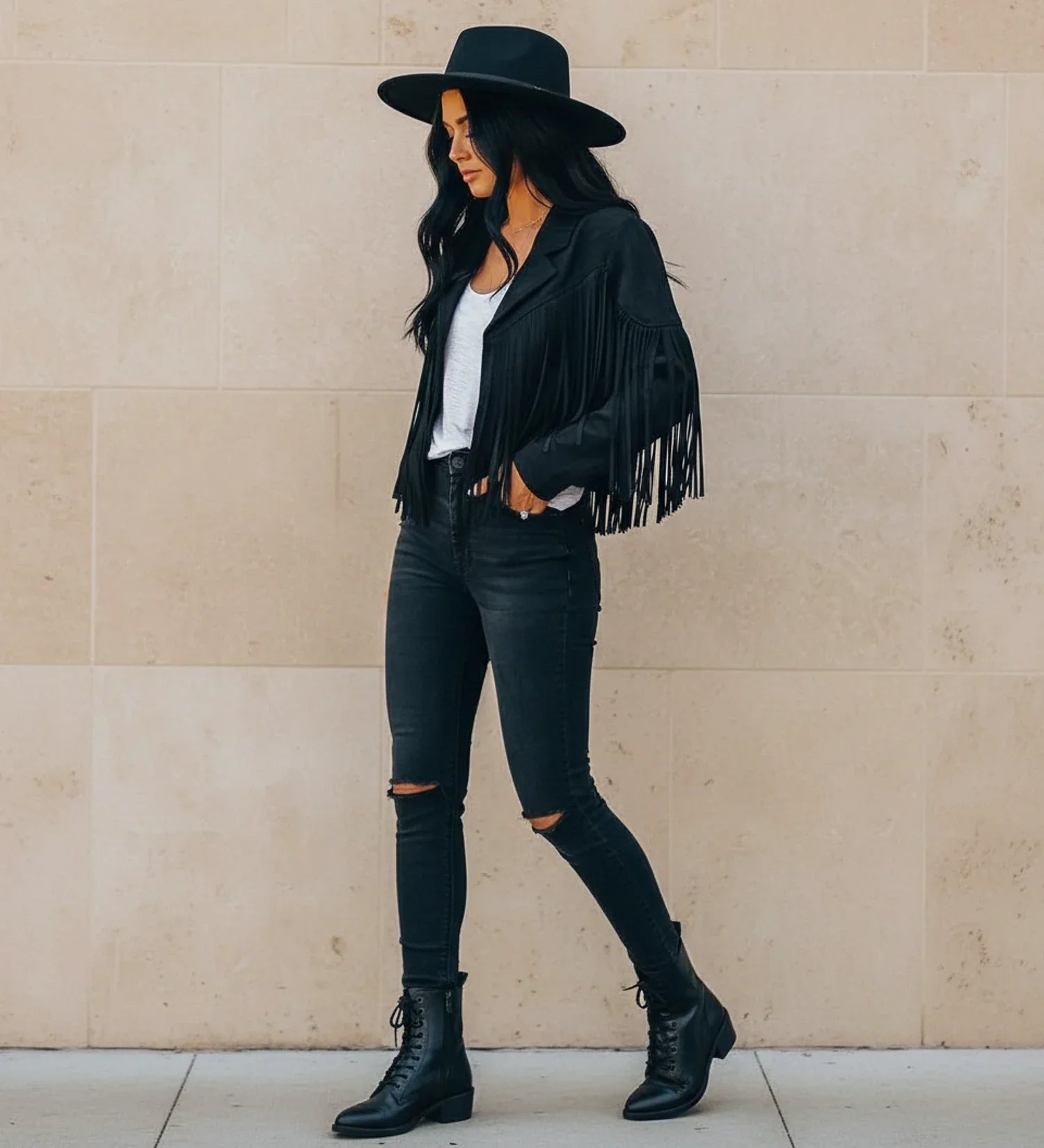Women's cropped fringed moto jacket open front notch lapel bold Western style statement piece
