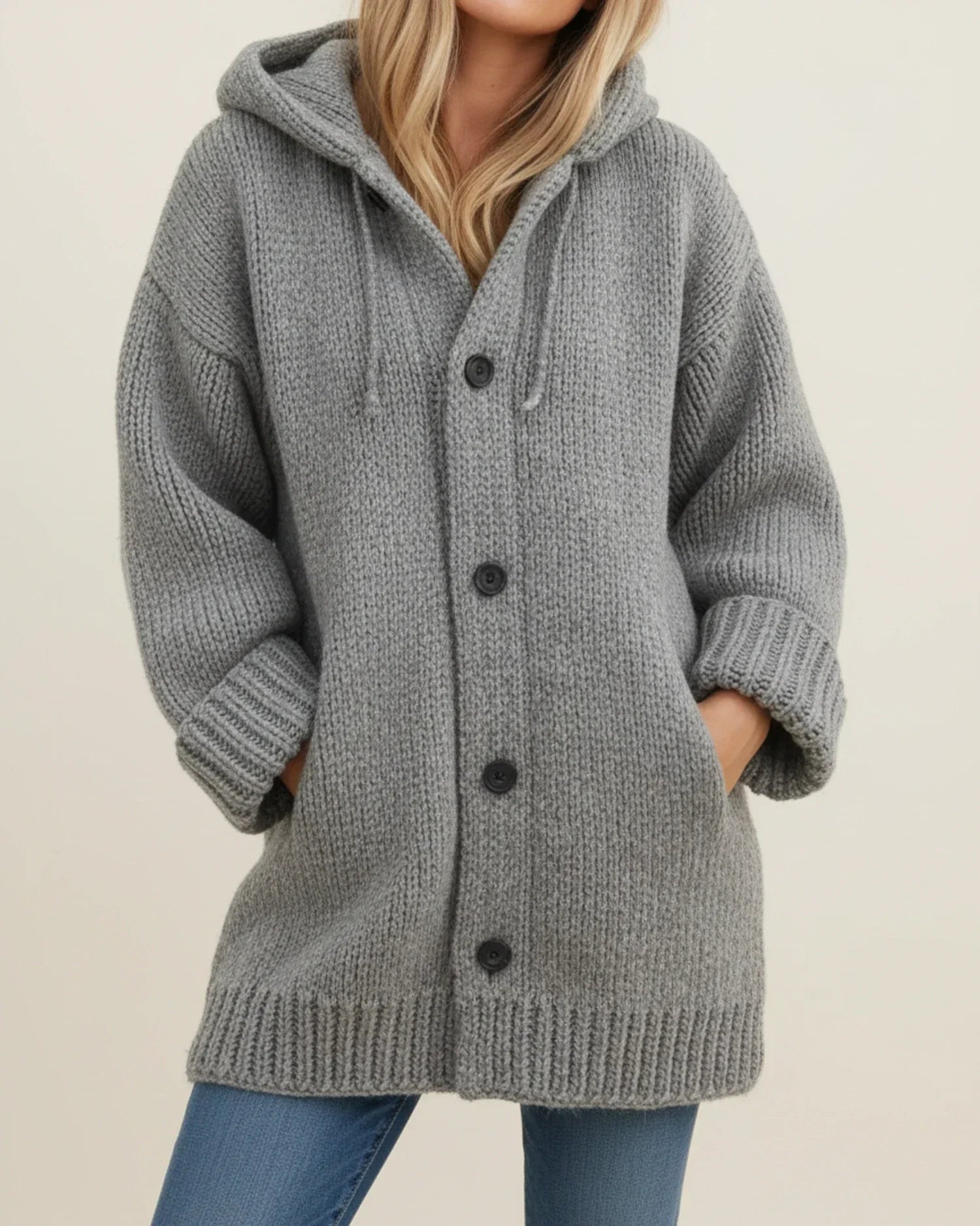 Women's oversized hooded cardigan jacket with button front, cozy knit texture, casual layering essential