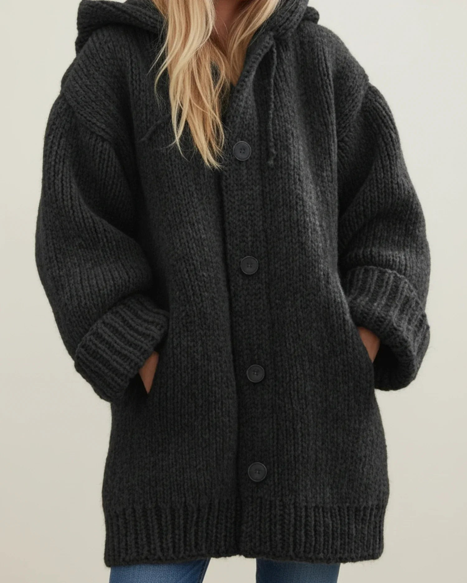 Women's oversized hooded cardigan jacket with button front, cozy knit texture, casual layering essential