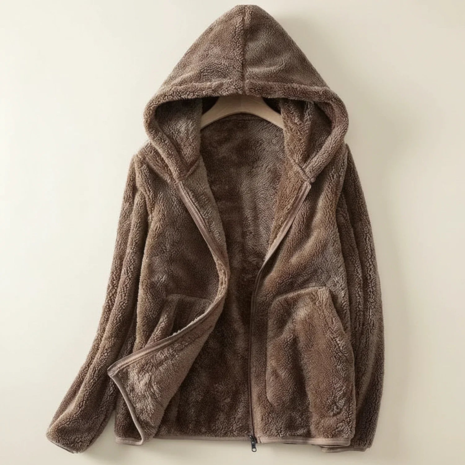 Women's hooded fleece jacket relaxed fit full-zip closure with patch pockets for everyday layering