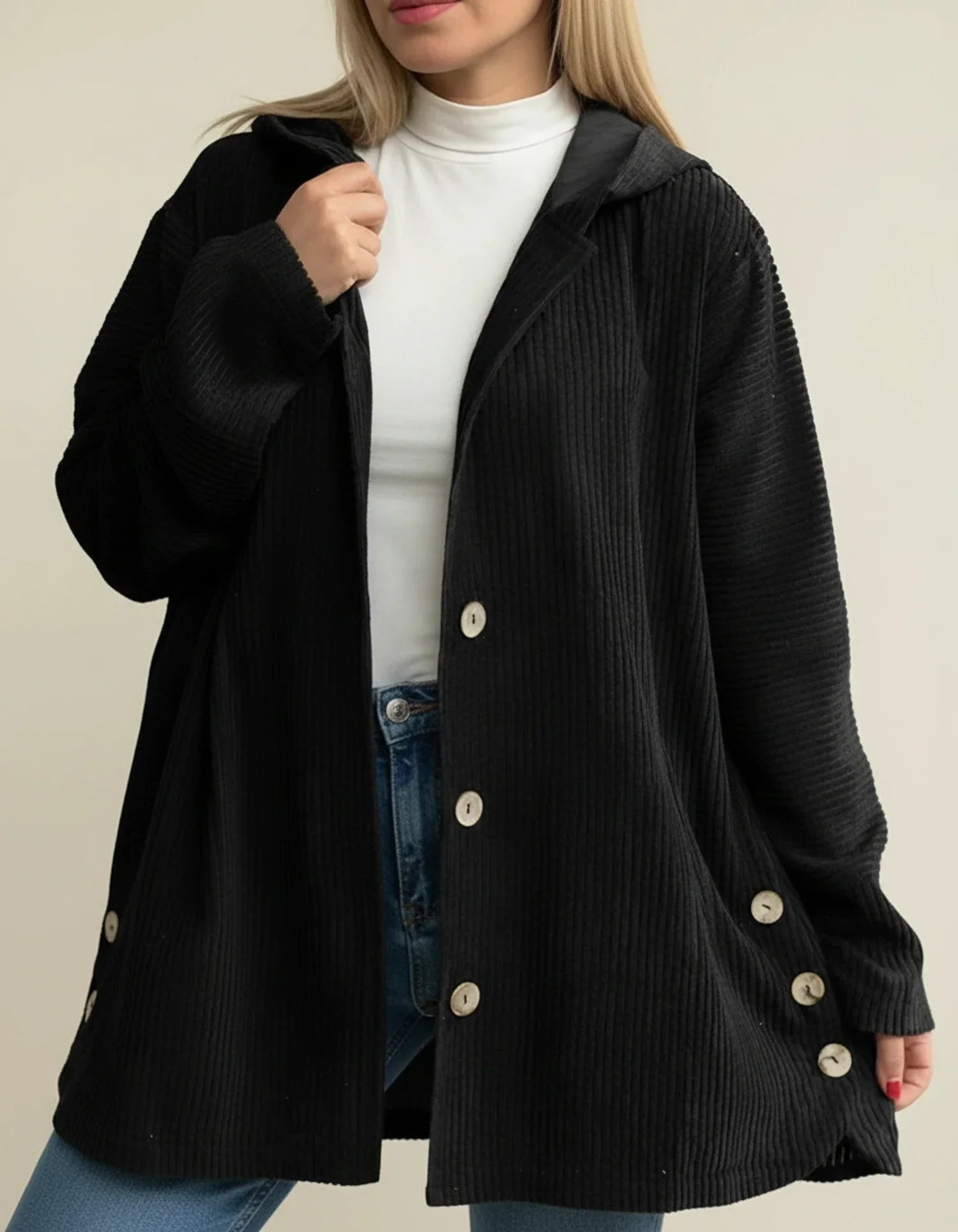 Women's oversized longline hooded mid-length jacket with button closure for effortless layering