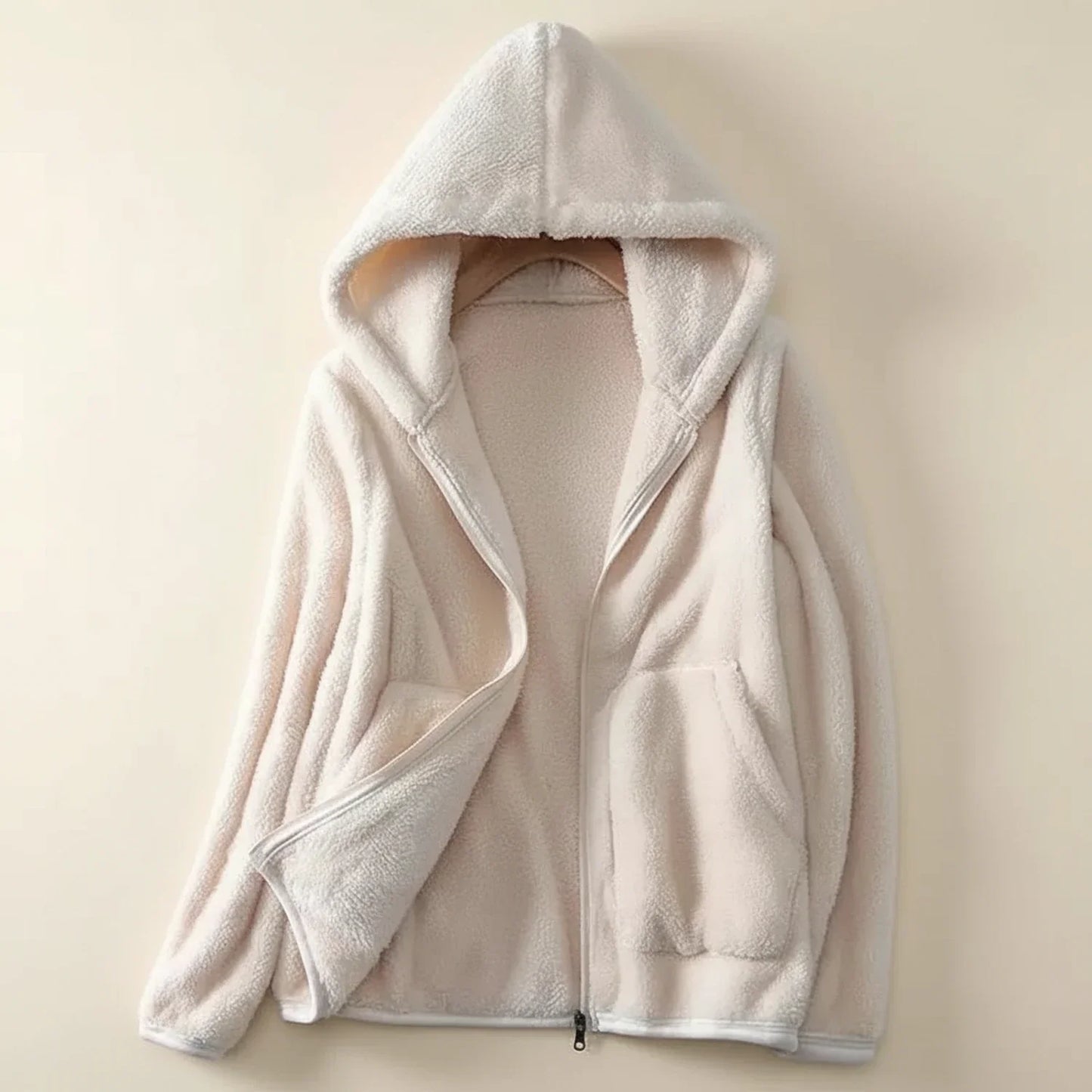 Women's hooded fleece jacket relaxed fit full-zip closure with patch pockets for everyday layering