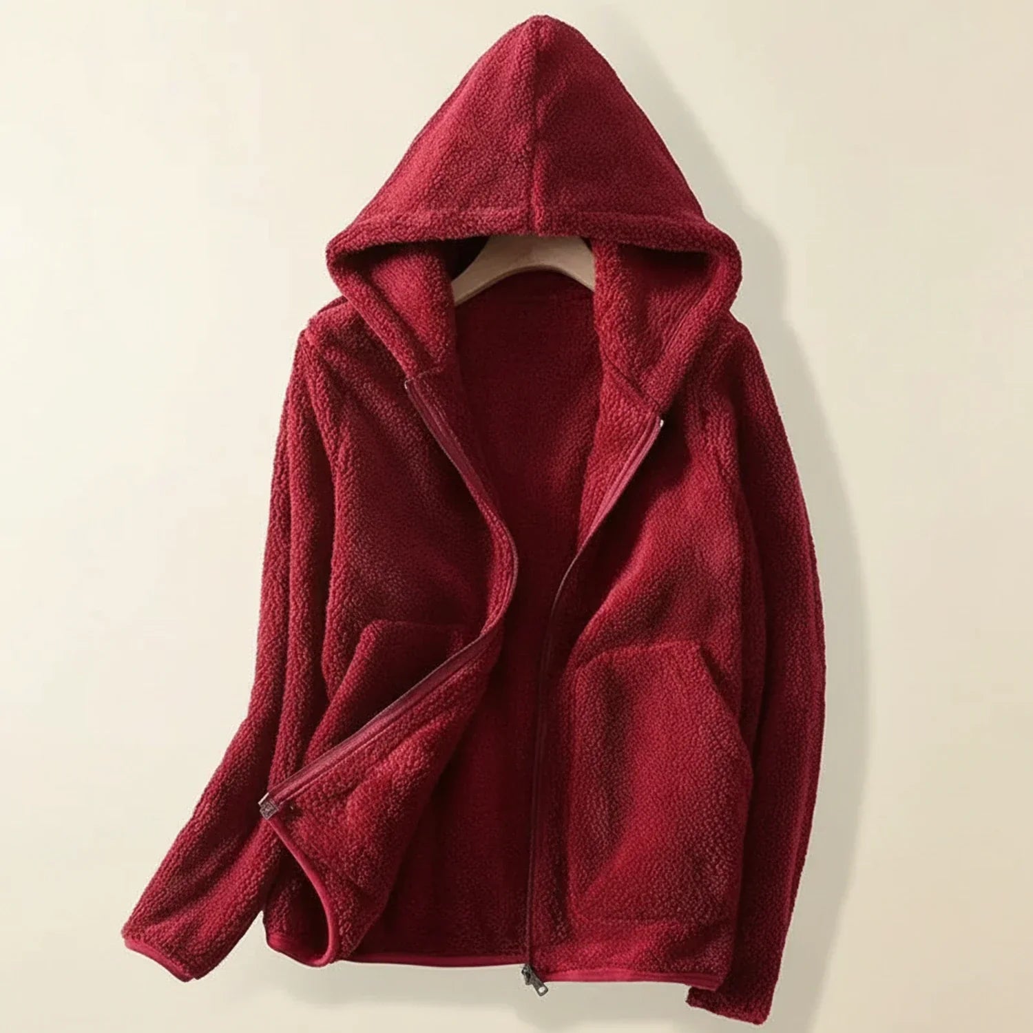 Women's hooded fleece jacket relaxed fit full-zip closure with patch pockets for everyday layering