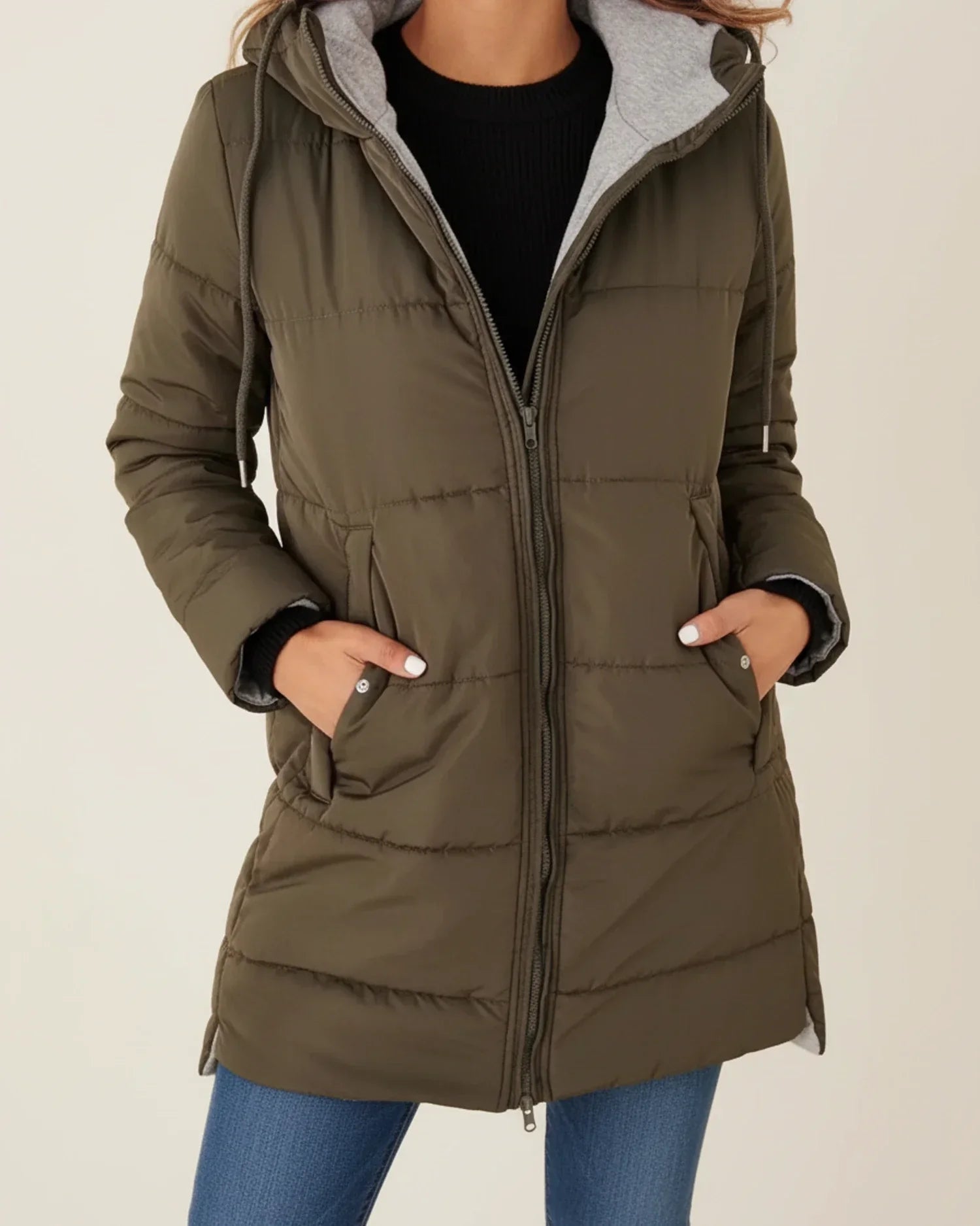 Women's long quilted hooded puffer jacket mid-length silhouette zip-up front cold weather city style