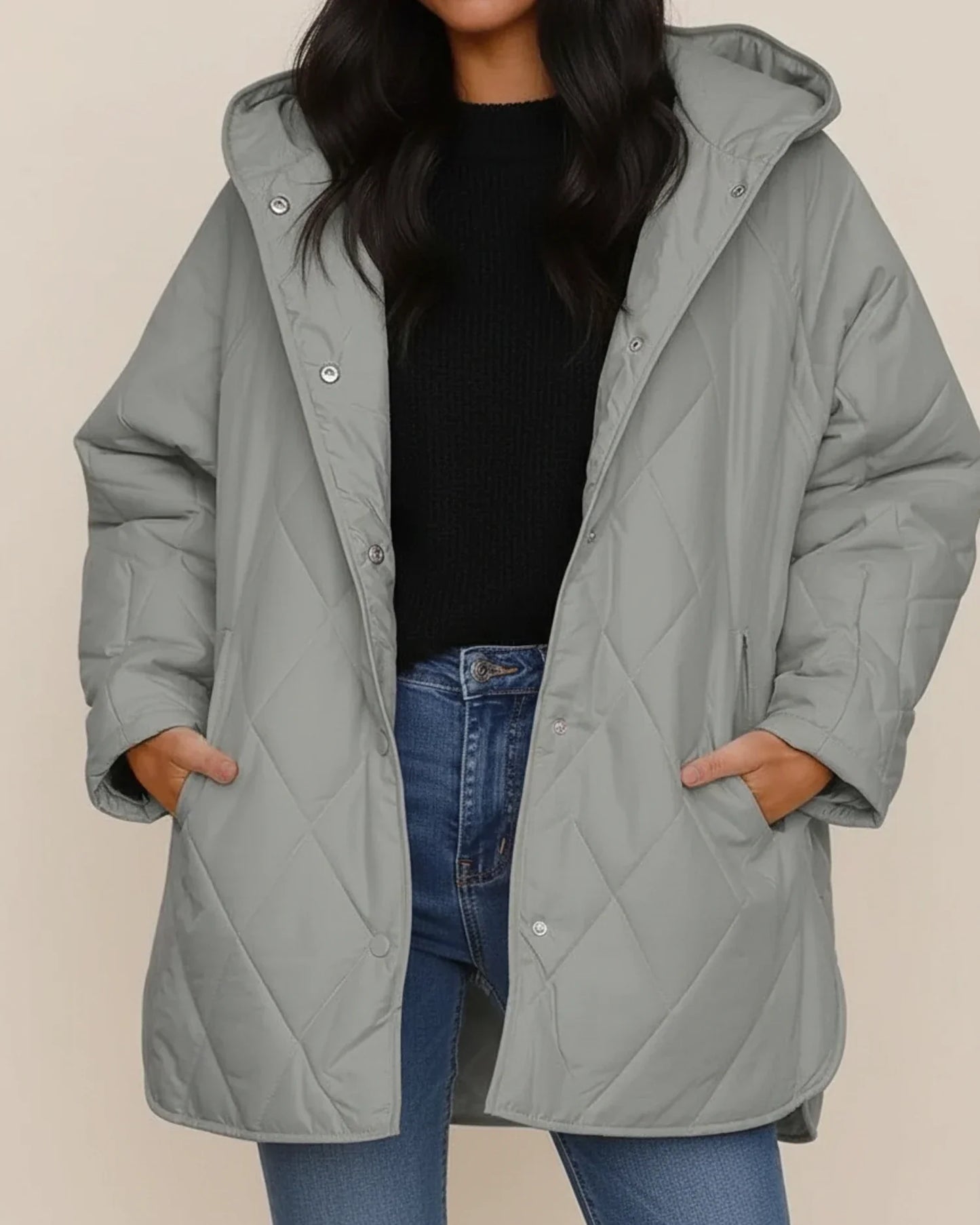 Women's black oversized quilted longline hooded winter jacket with cozy insulated design
