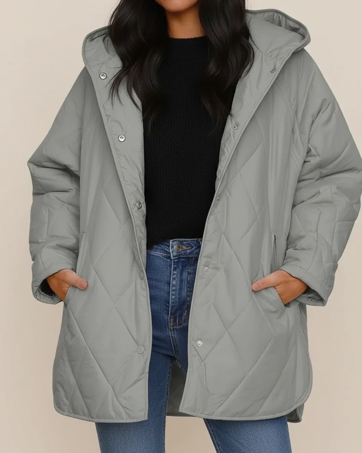 Women's black oversized quilted longline hooded winter jacket with cozy insulated design