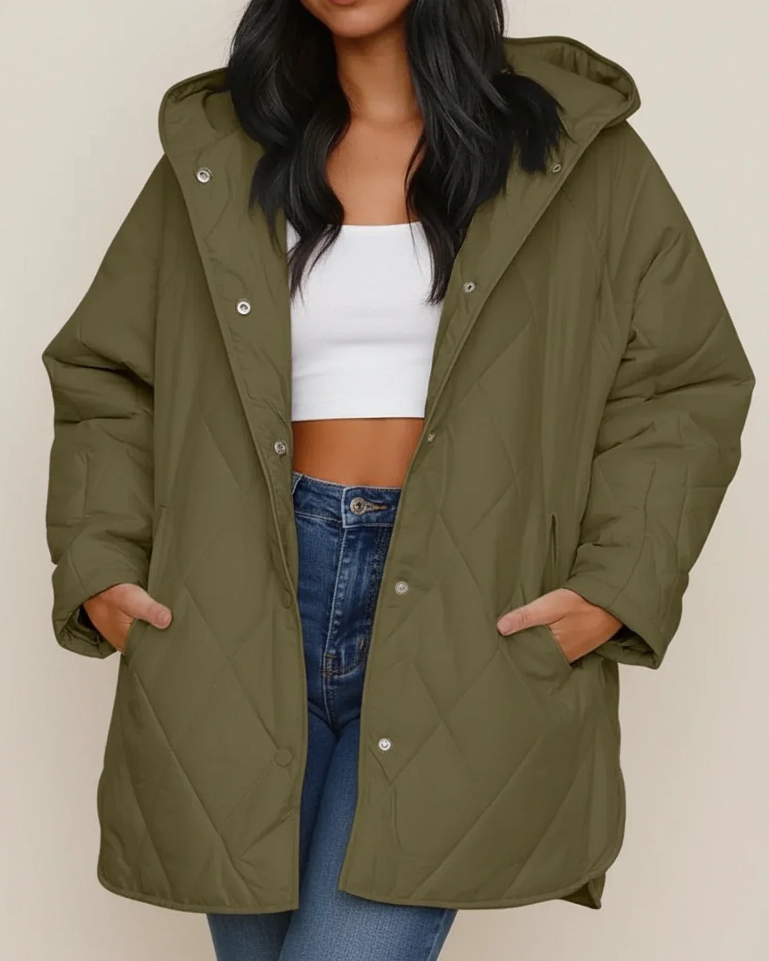 Women's oversized quilted longline hooded winter jacket in neutral tone for everyday warmth