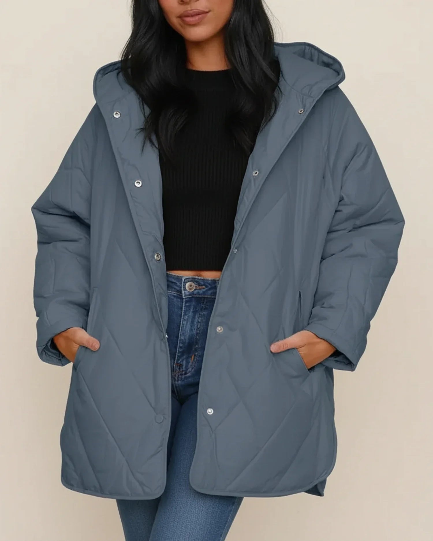 Women's oversized quilted longline hooded winter jacket in neutral tone for everyday warmth