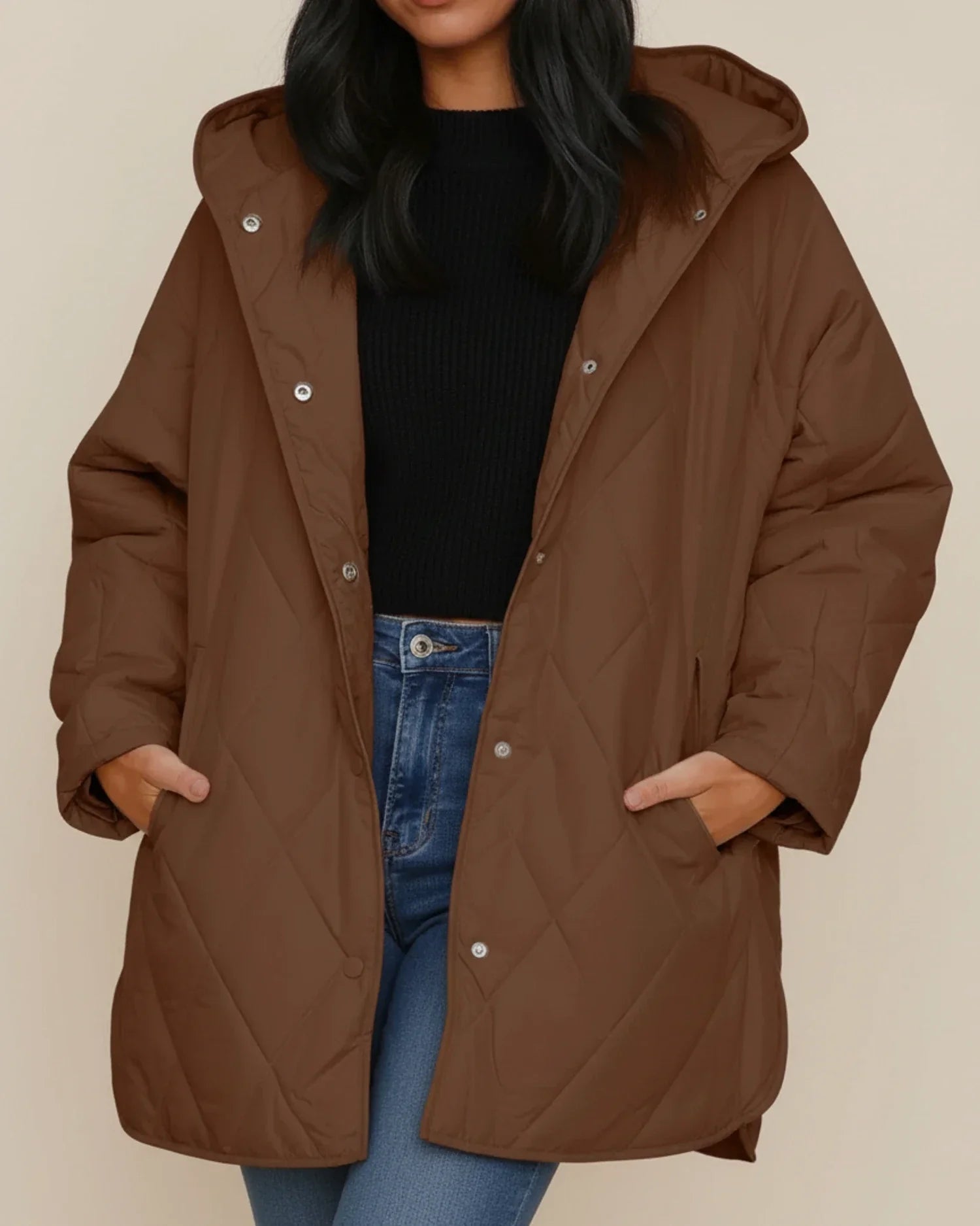 Women's oversized quilted longline winter jacket with attached hood for everyday warmth and style