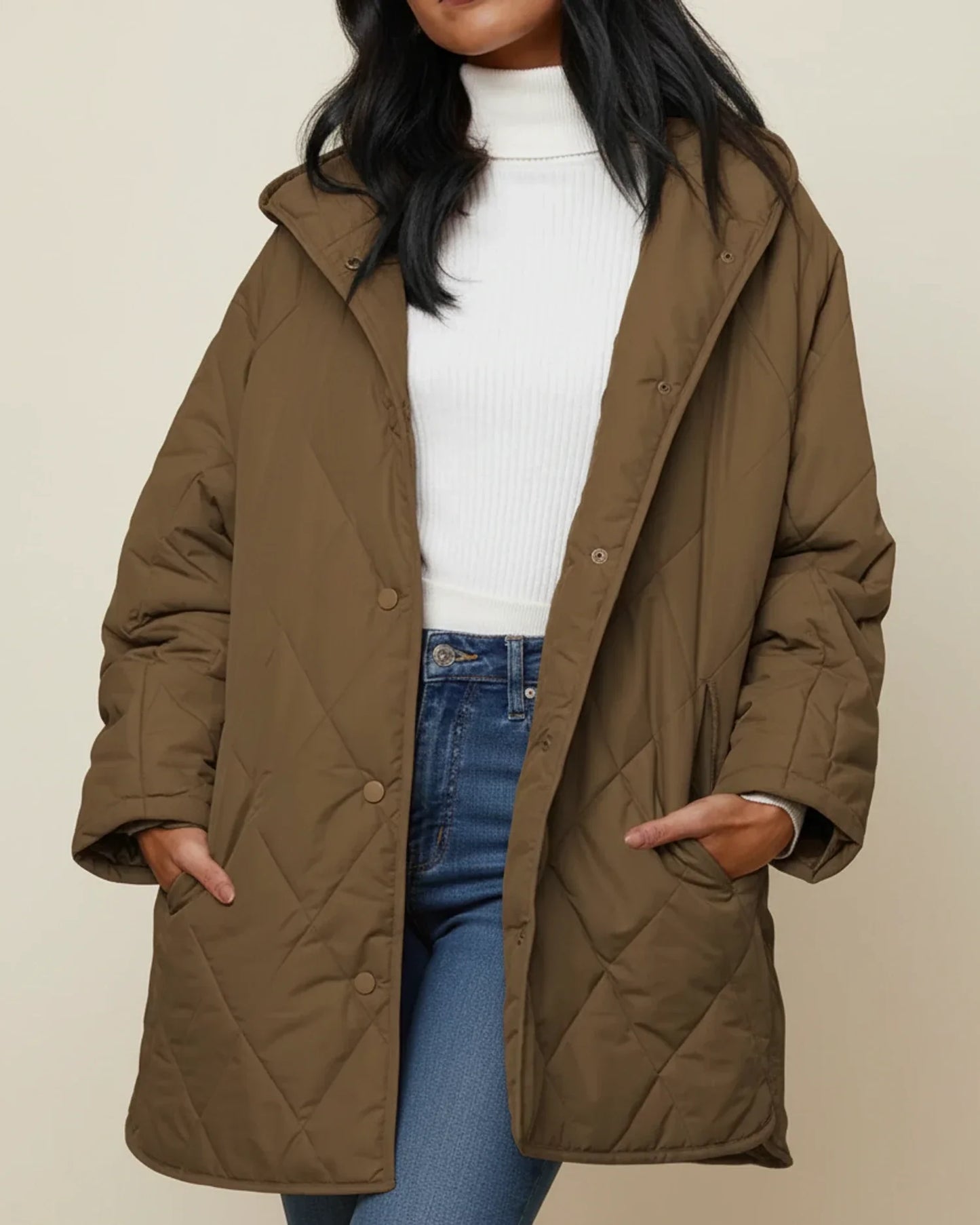 Women's oversized quilted longline hooded winter jacket in neutral tone for everyday warmth