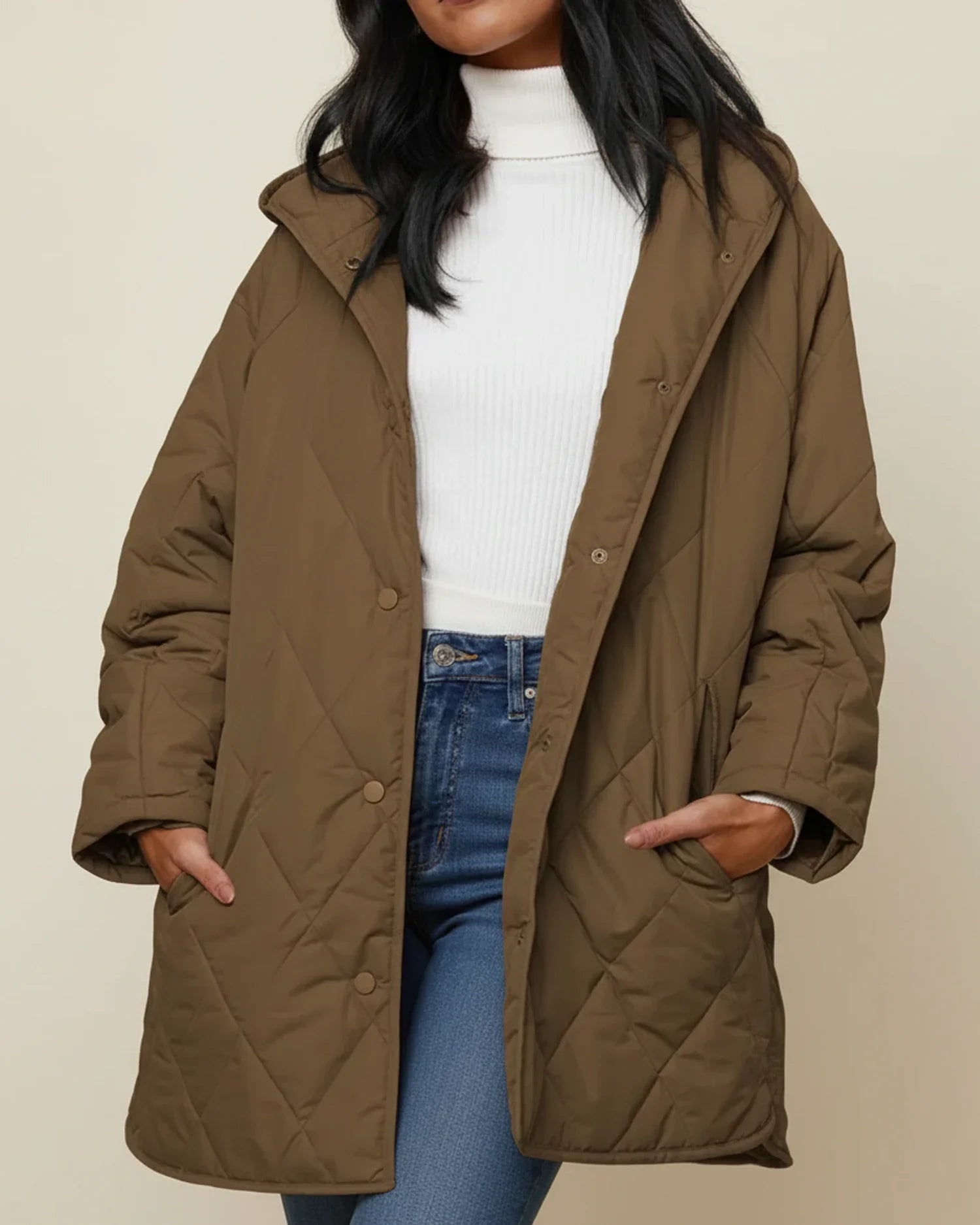 Women's oversized quilted longline hooded winter jacket in neutral tone for everyday warmth