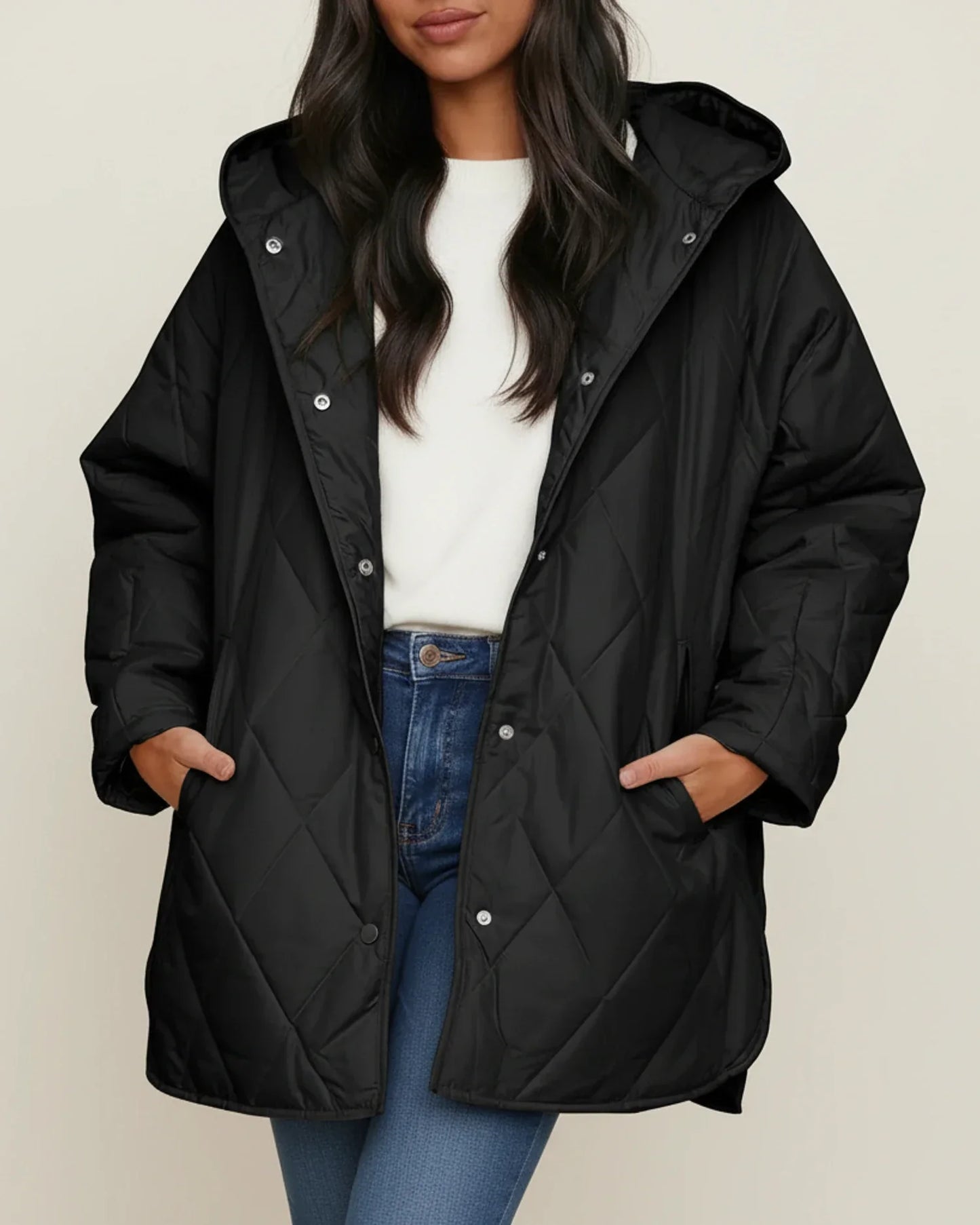 Women's oversized quilted longline hooded winter jacket in neutral tone for everyday warmth