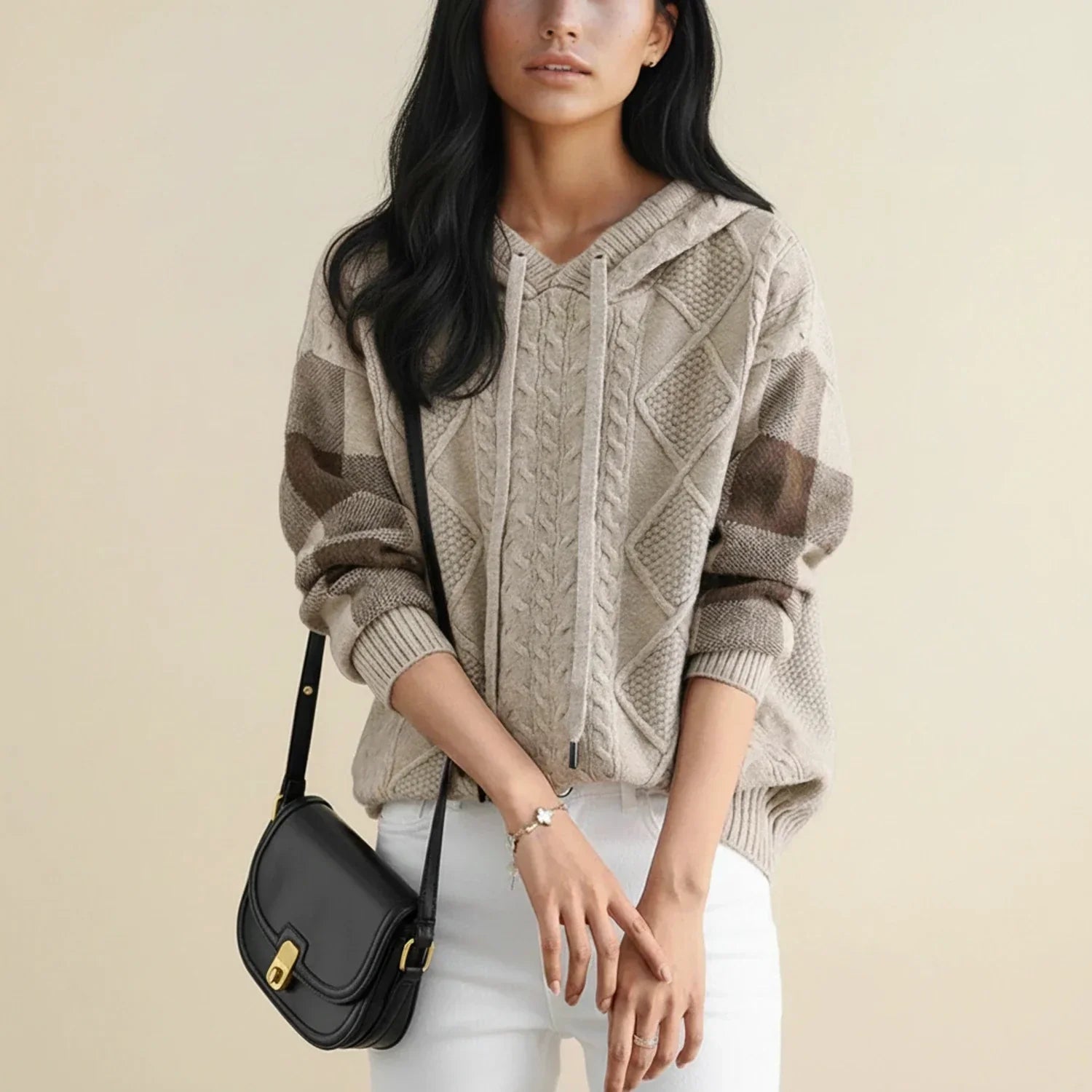 Women's hooded cable knit sweater with color block long sleeves and adjustable drawstring hood