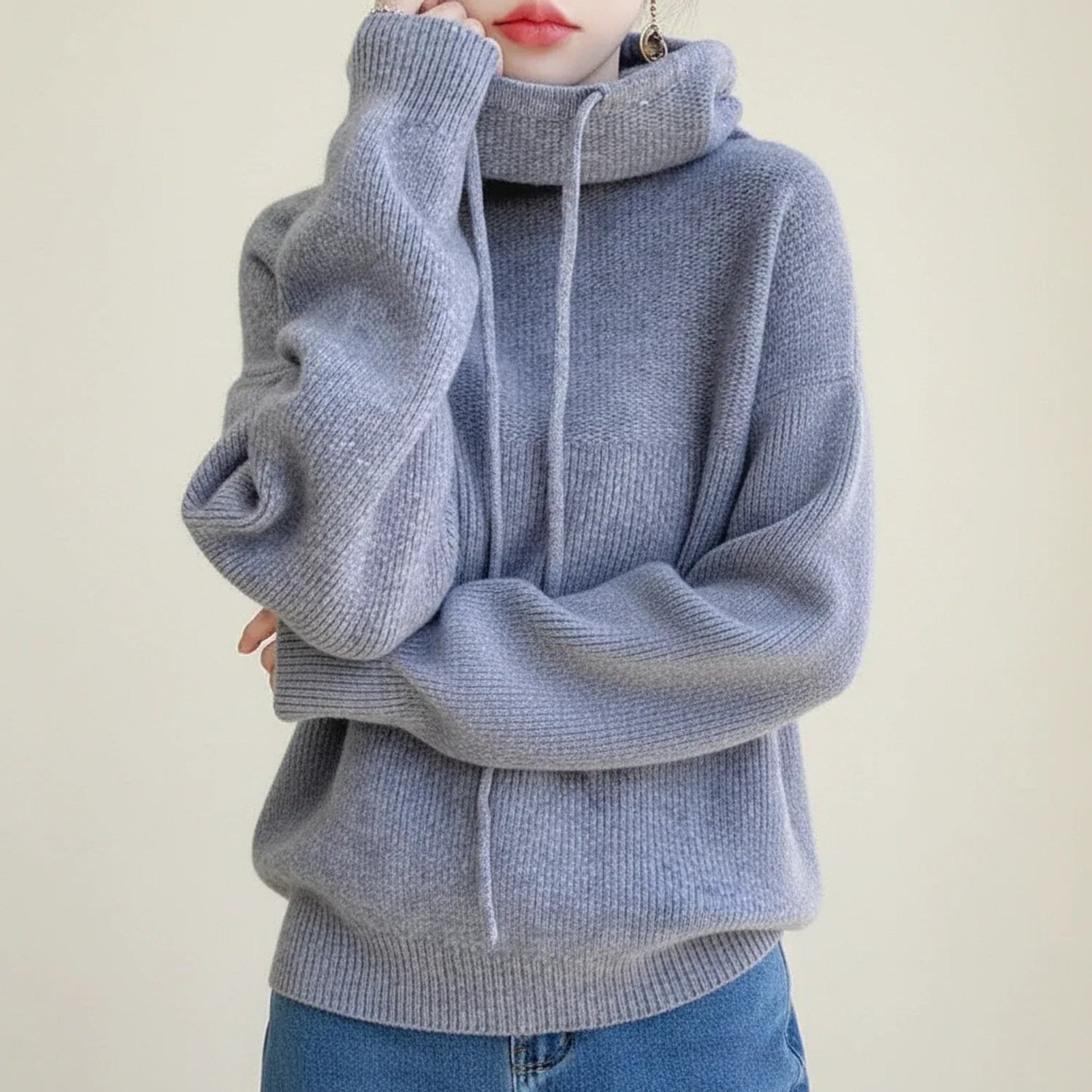 Women's oversized hooded knit sweater in cozy soft fabric with cowl neck drawstring winter warmth