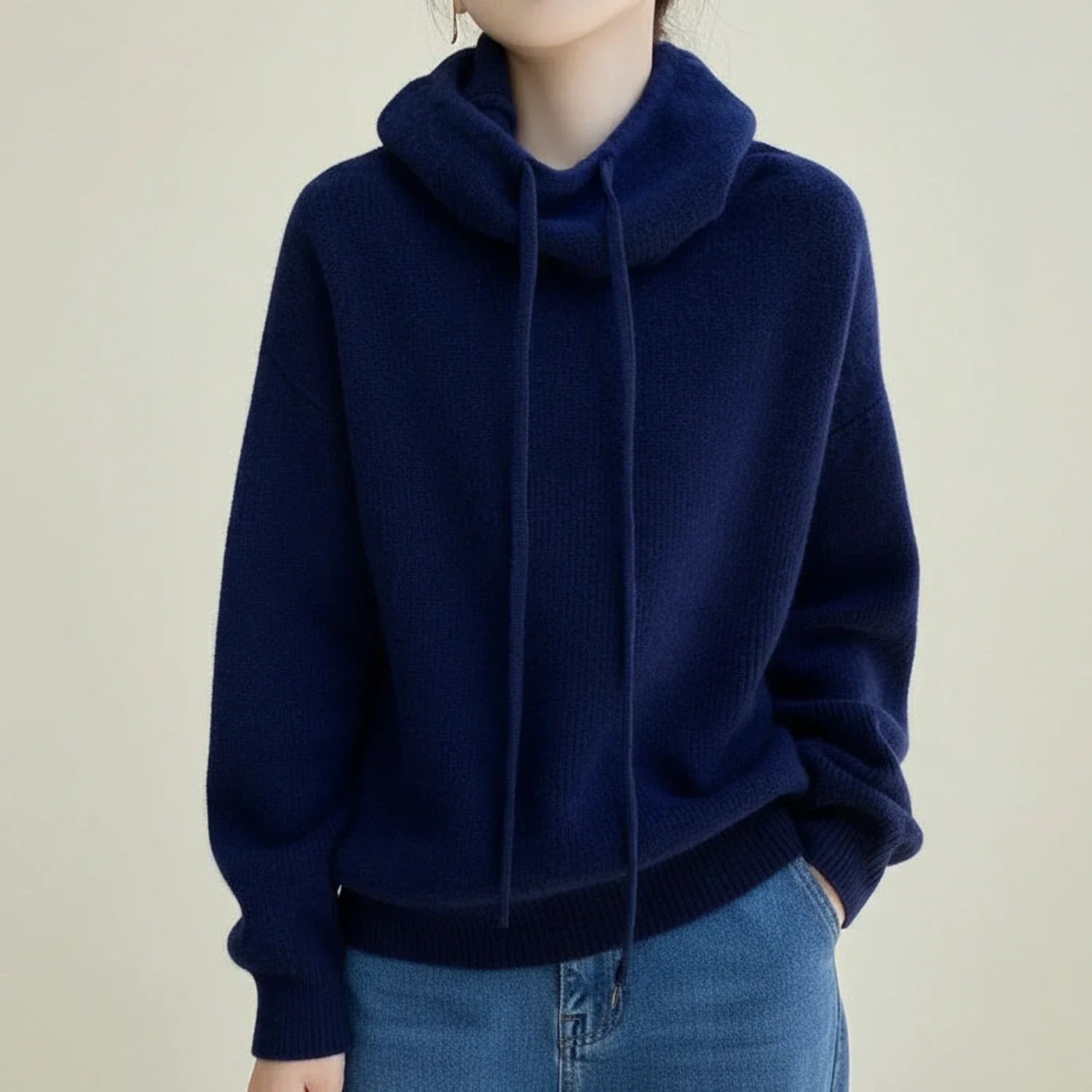 Women's oversized hooded cowl neck sweater in soft knit with drawstring detail for cozy winter warmth
