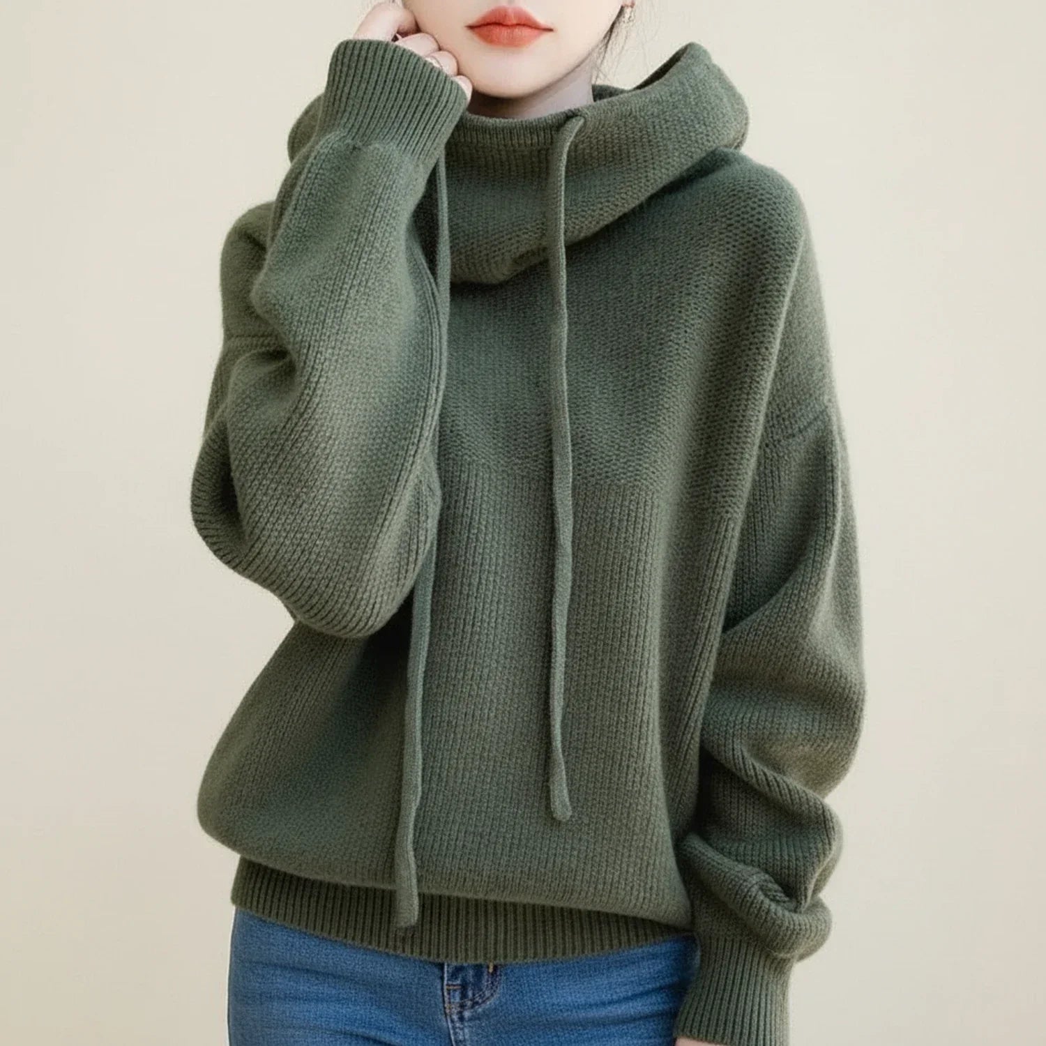 Women's oversized hooded cowl neck sweater in soft knit with drawstring detail for cozy winter warmth