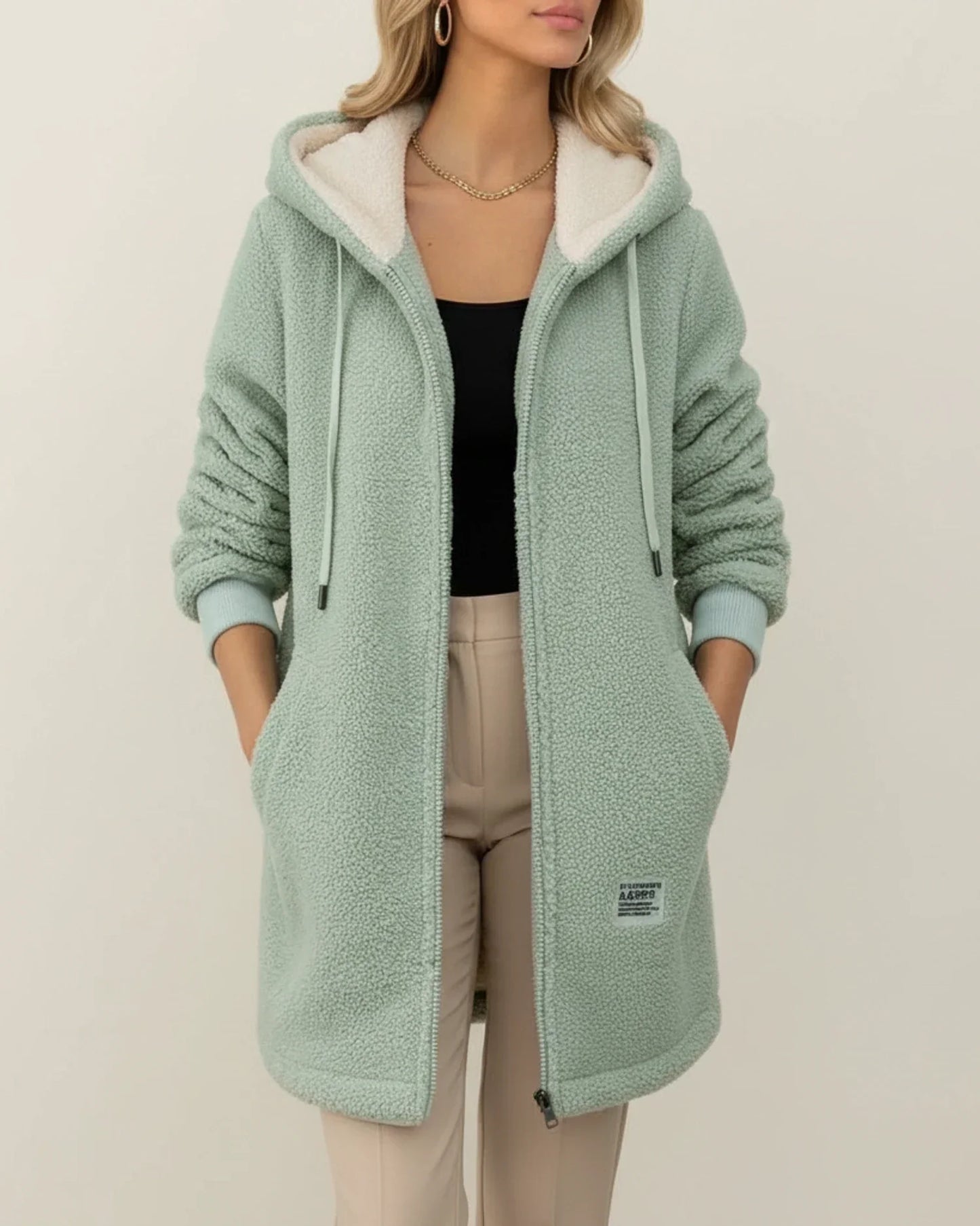 Women's camel teddy coat hooded longline silhouette fleece lining zip-front pockets casual chic
