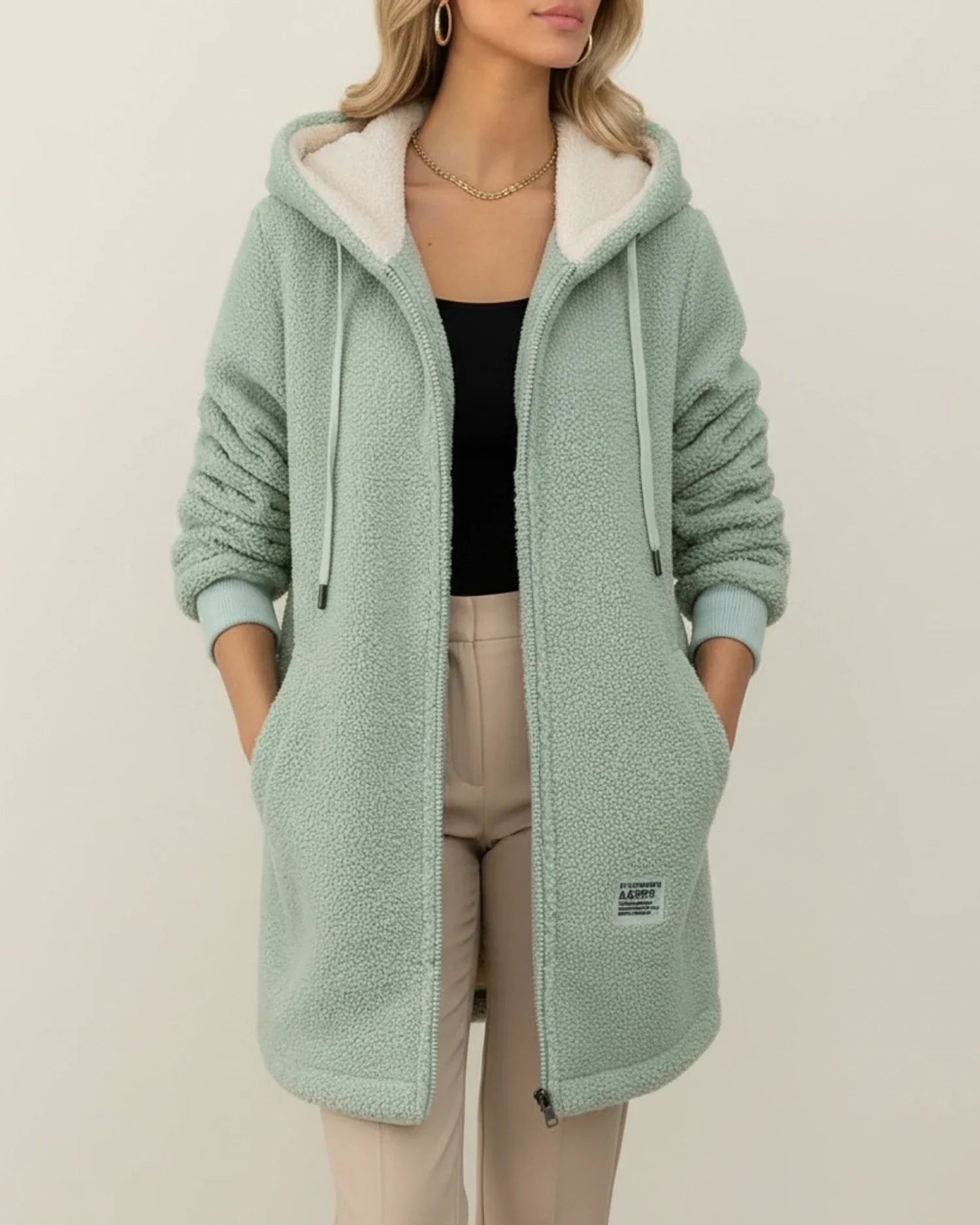 Women's camel teddy coat hooded longline silhouette fleece lining zip-front pockets casual chic