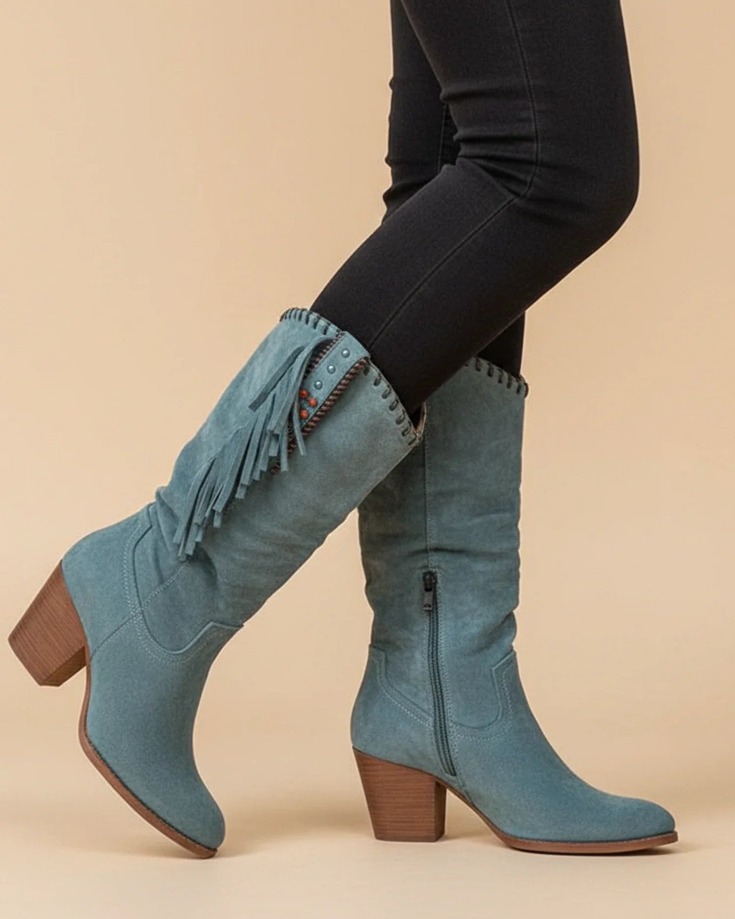 Women's knee-high western boots with fringe detailing, sleek elongated shaft for modern everyday style