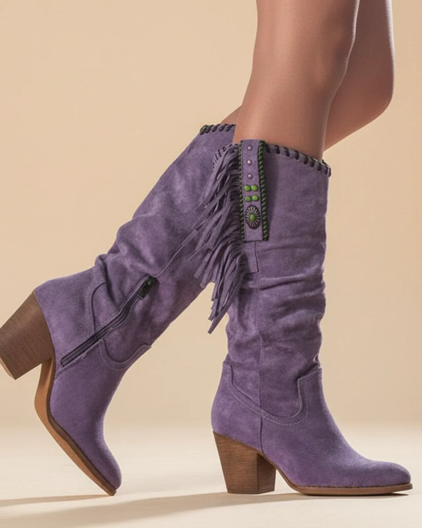 Women's knee-high western boots with fringe detailing, sleek elongated shaft for modern everyday style