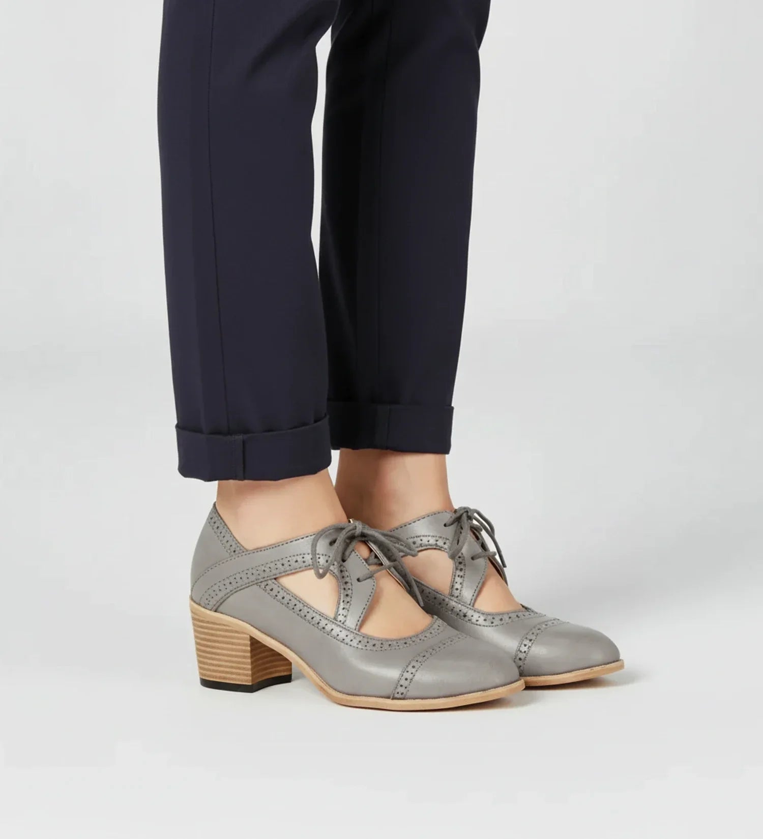 Women's lace-up block heel Oxford pumps with cutout detail in classic neutral tone for all-day comfort