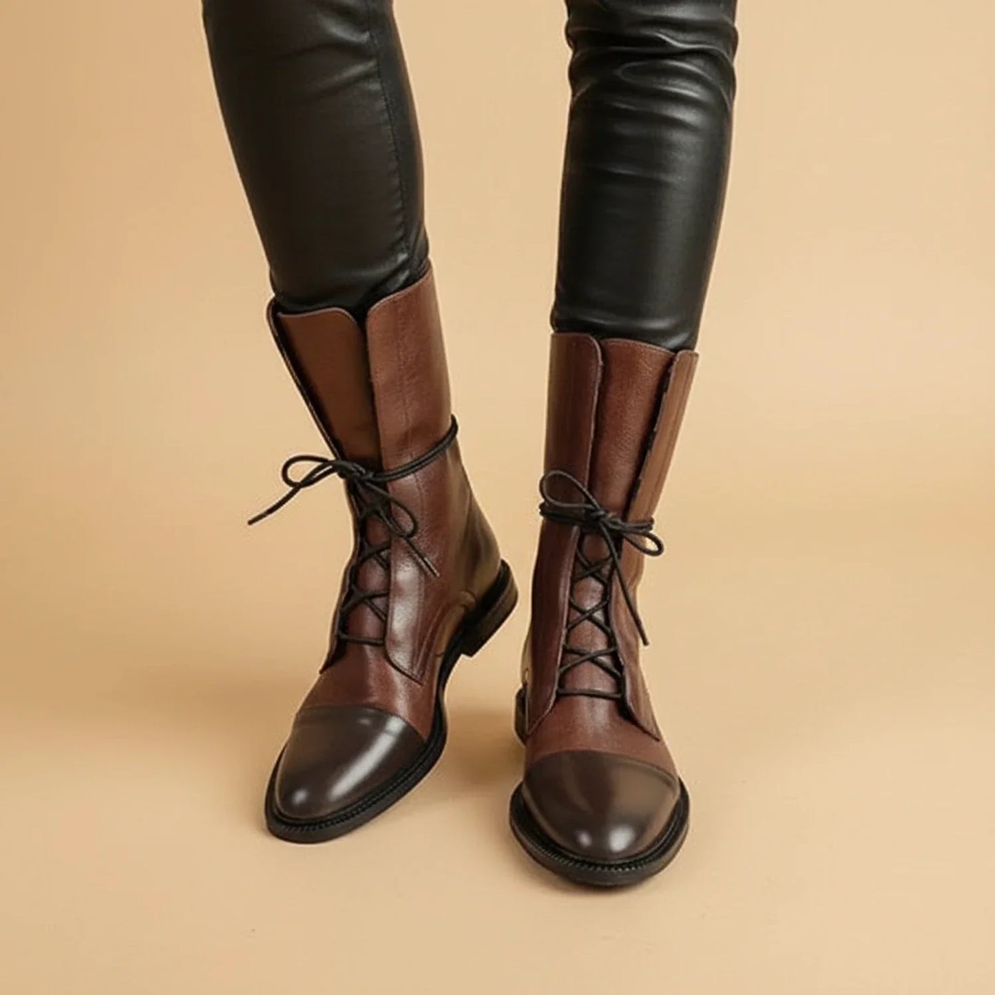 Women's black leather lace-up ankle boots combat style with durable polished finish by Urbann-Vibe