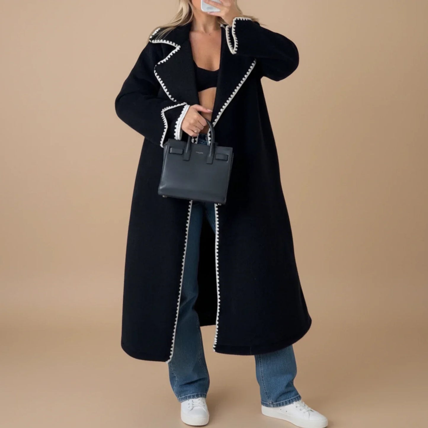 Women's longline open-front duster coat with contrast trim, chic versatile layering piece