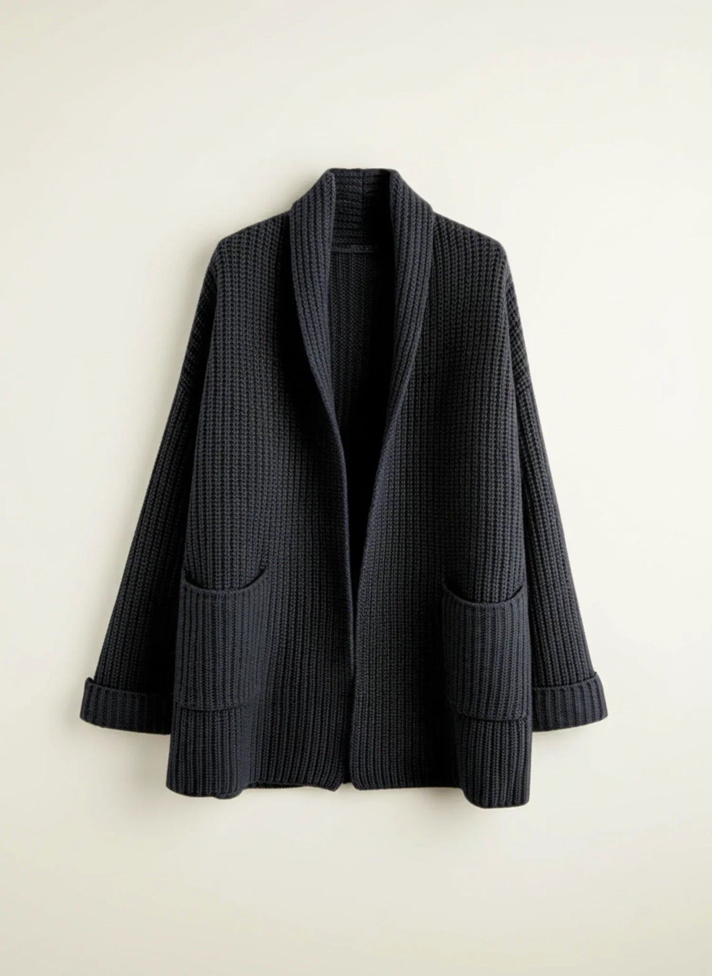 Women's oversized open-front cardigan with shawl collar and patch pockets for relaxed cozy layering