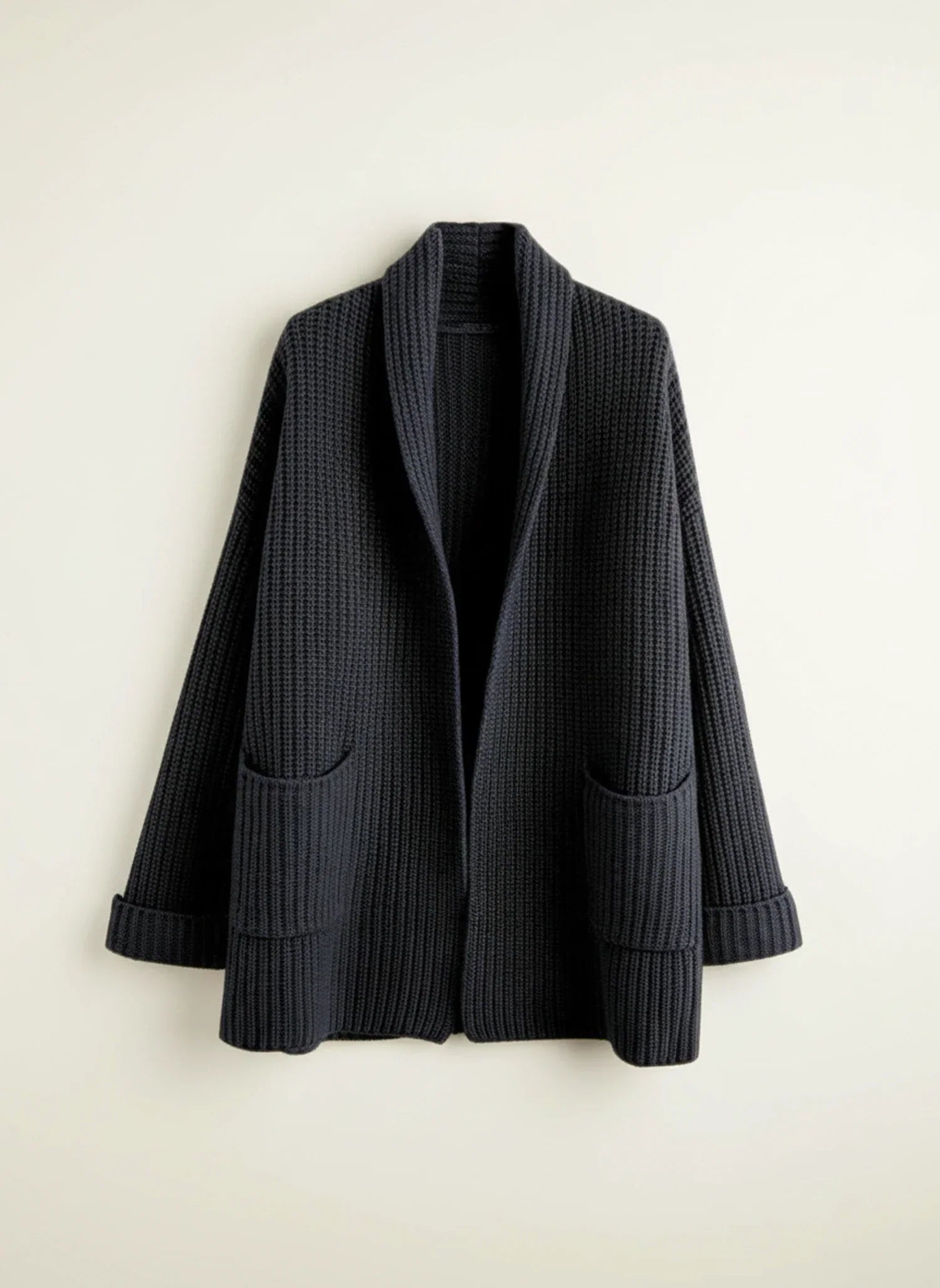 Women's oversized open-front cardigan with shawl collar and patch pockets for relaxed cozy layering