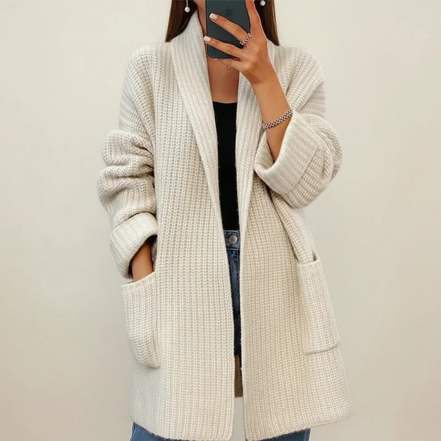 Women's oversized open-front cardigan with shawl collar and patch pockets for cozy layering