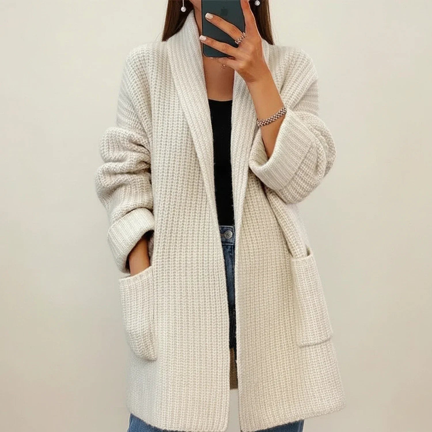 Women's oversized open-front cardigan with shawl collar and patch pockets for cozy layering