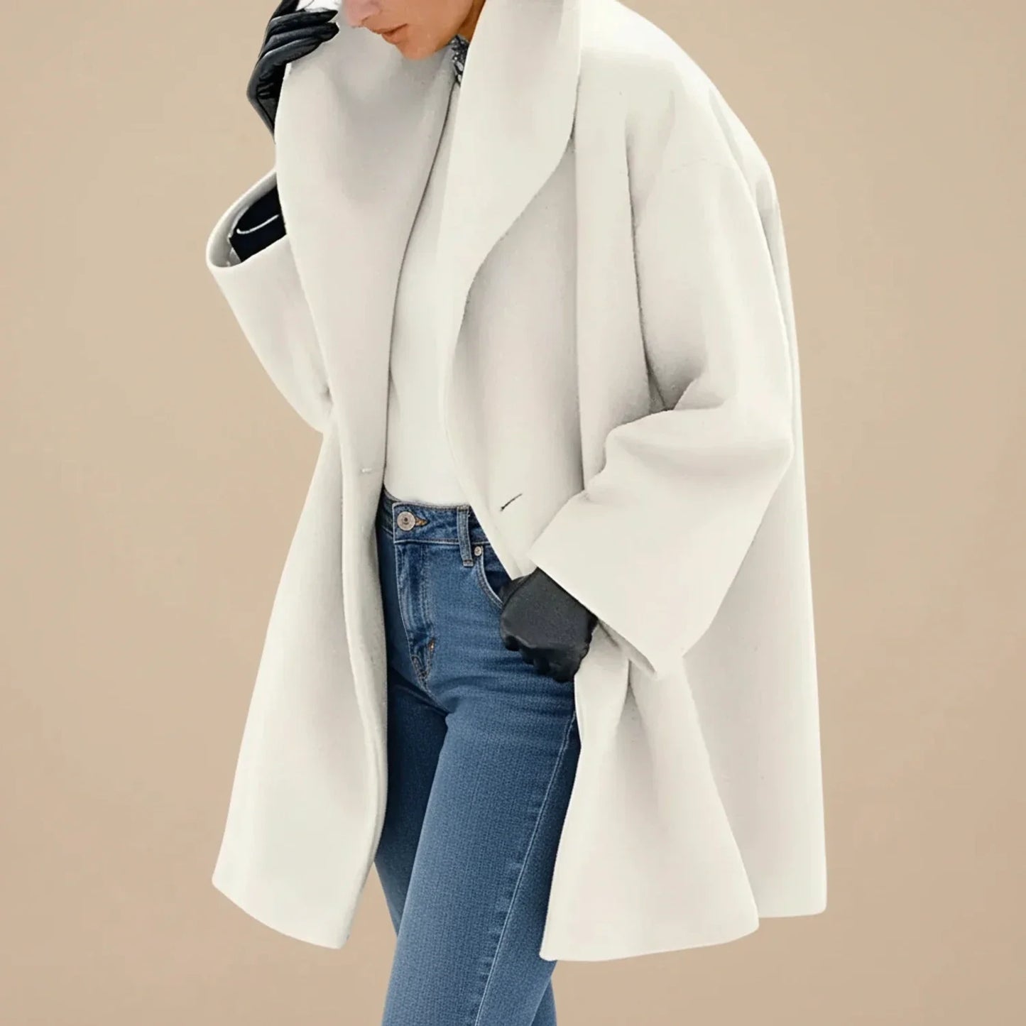 Women's oversized mid-length winter coat swing silhouette wide collar effortless chic style