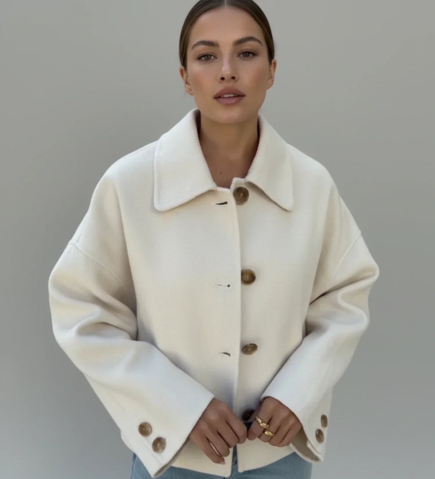 Women's cropped double-breasted pea coat, oversized boxy silhouette in classic chic layerable style