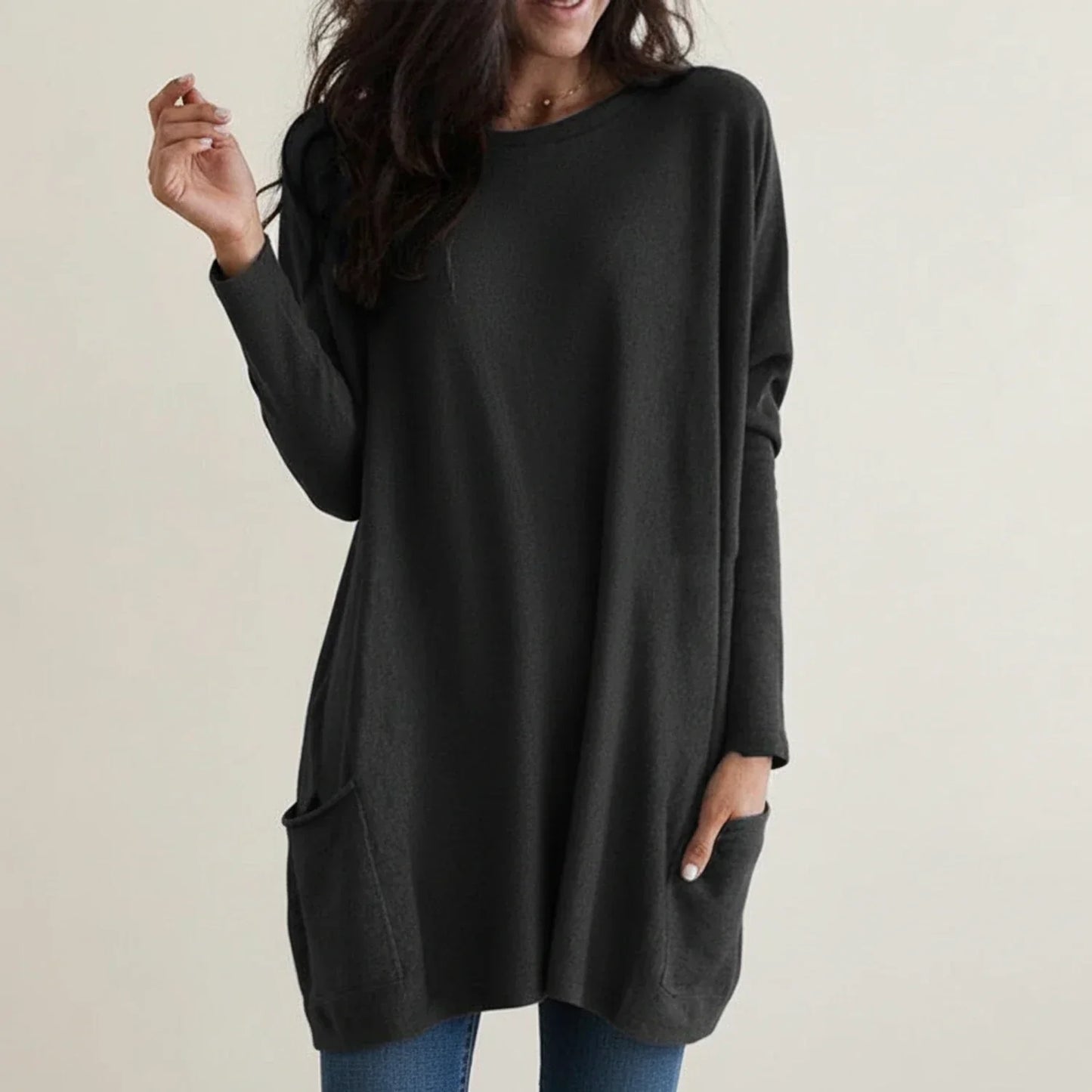 Women's oversized knit sweater dress with pockets, long sleeves, relaxed cozy silhouette