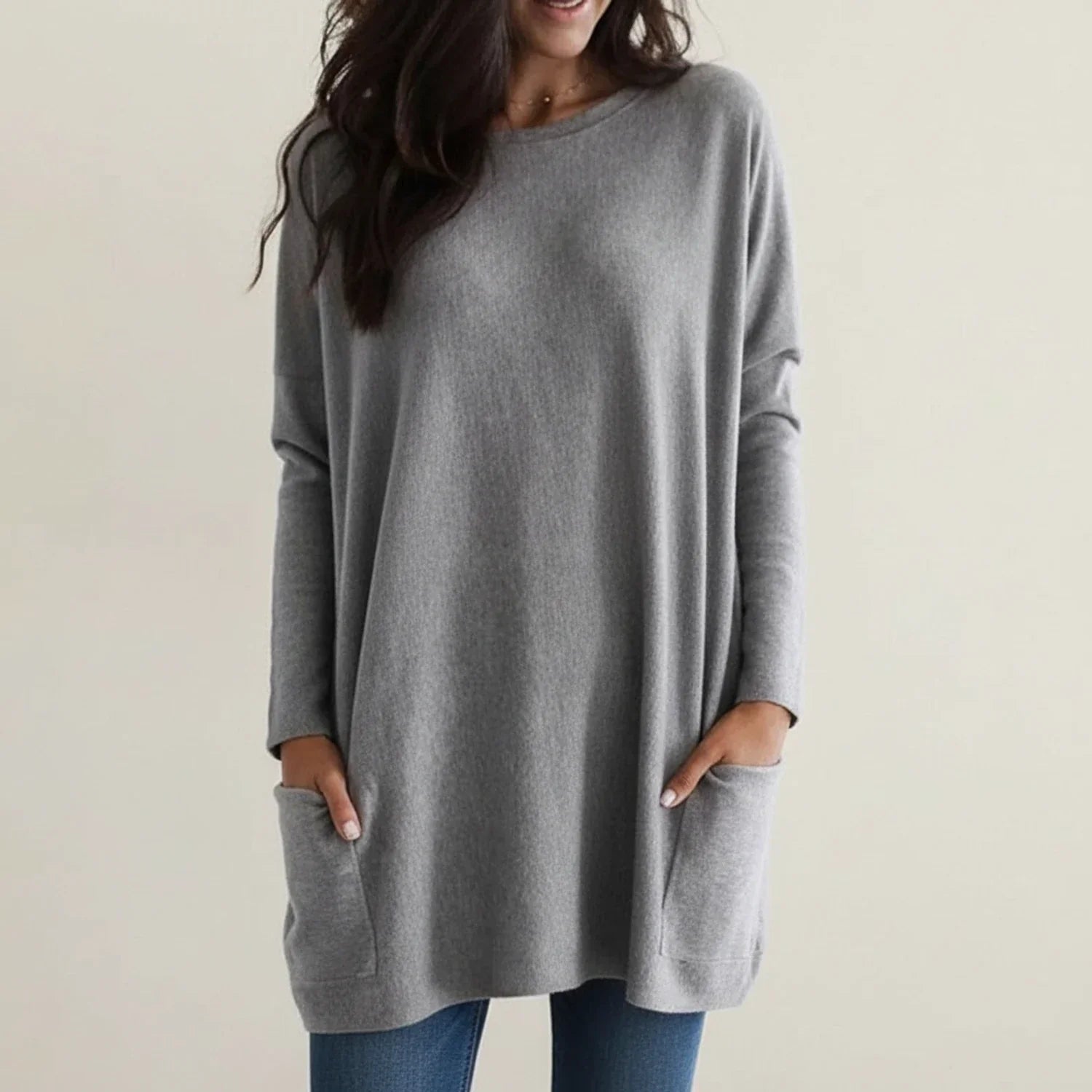 Women's cozy oversized knit sweater dress with pockets, long sleeves, relaxed silhouette